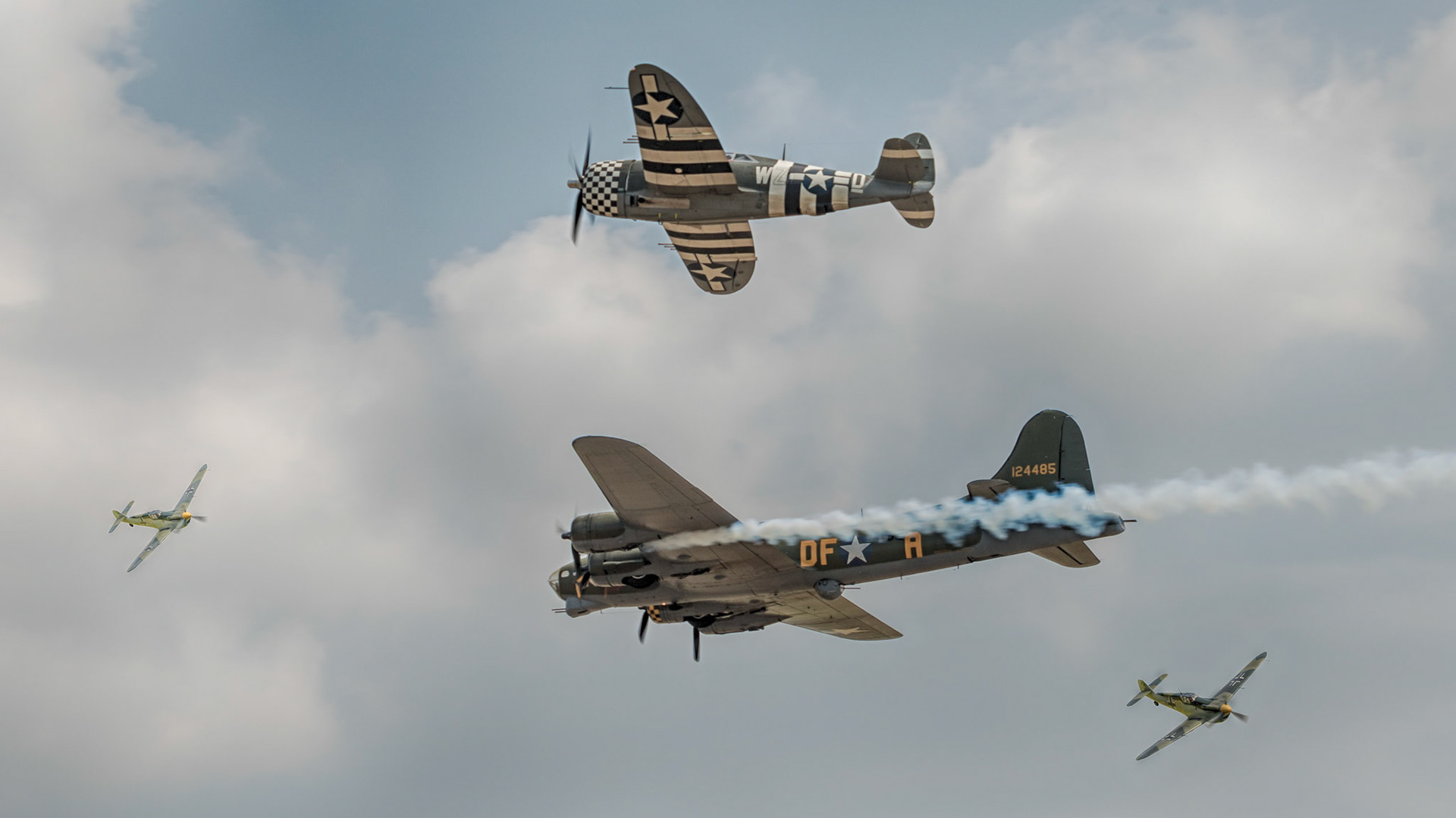 Flying fortress under attack by two German fighters during attack over France