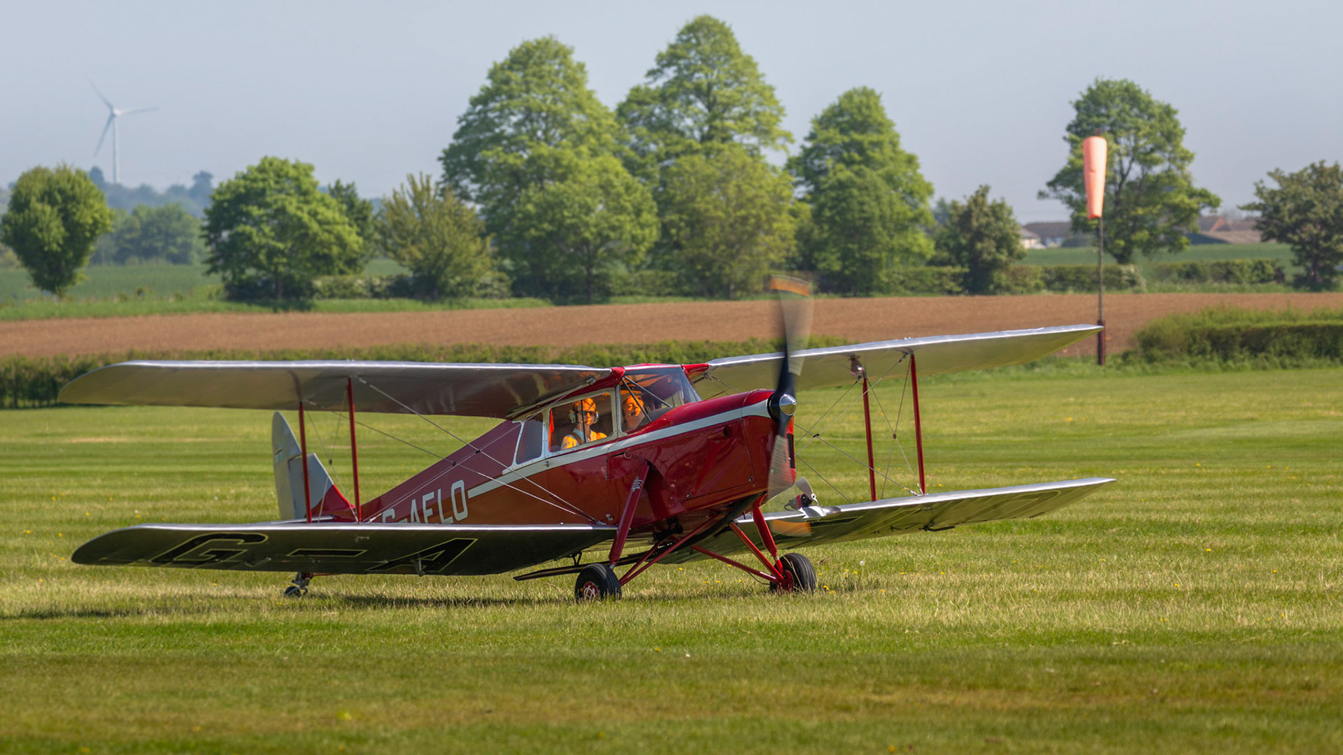 Biggleswade, UK - 6th May 2018: A beautiful vintage de Havilland DH.87 Hornet Moth landing at airfield
