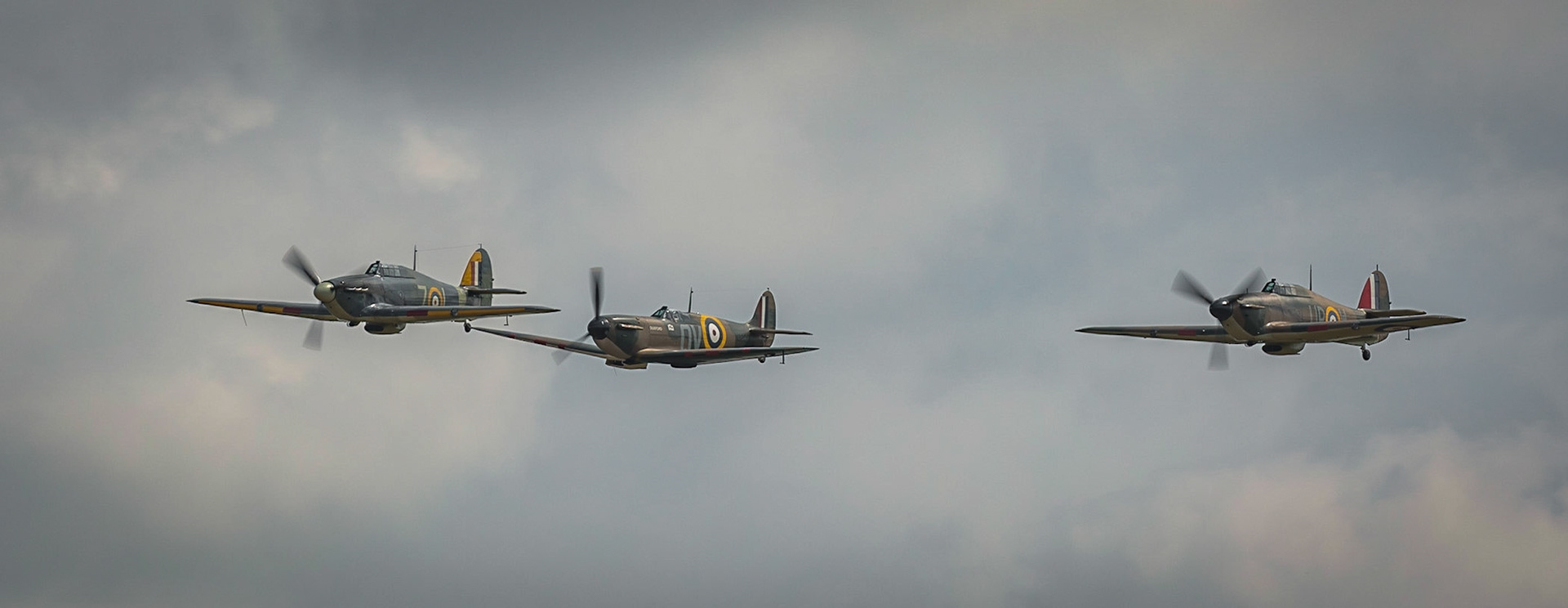 Biggleswade, UK - 7th May 2017: Vintage British Sptitfire and Hurricanes in flight