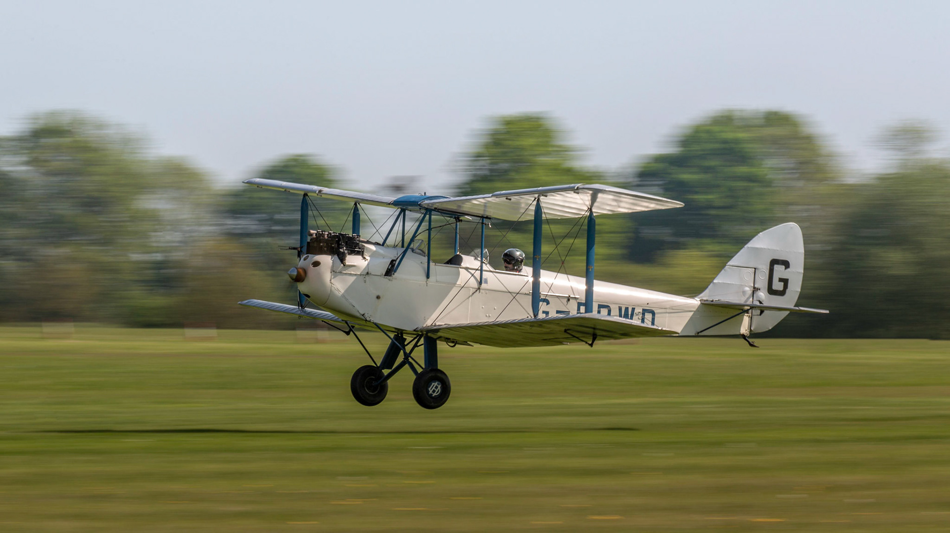 Biggleswade, UK - 6th May 2018:  A 1928 De Havilland DH60X Moth vintage biplane landing at airfield