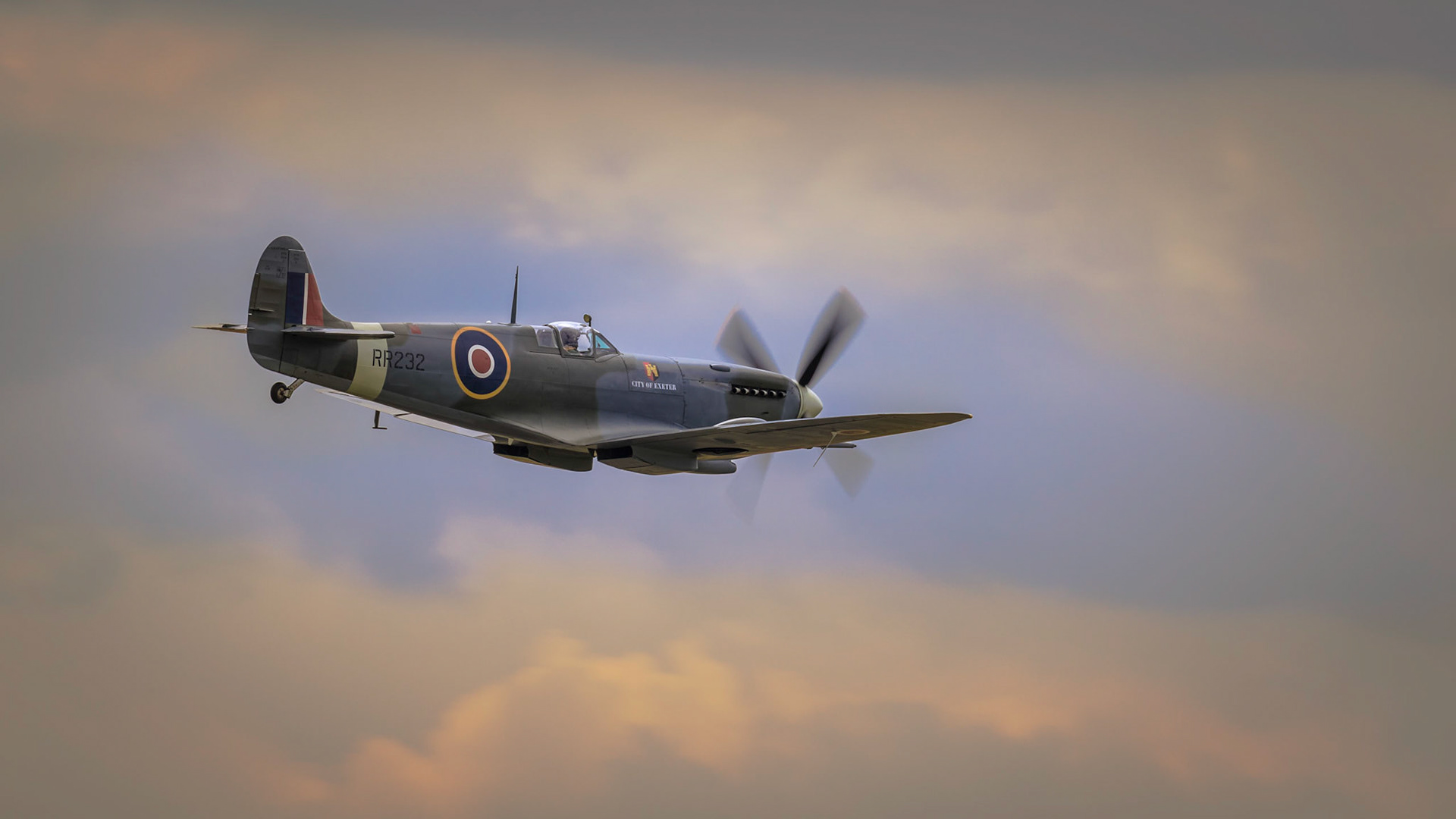 Vintage British Spitfire at sundown
