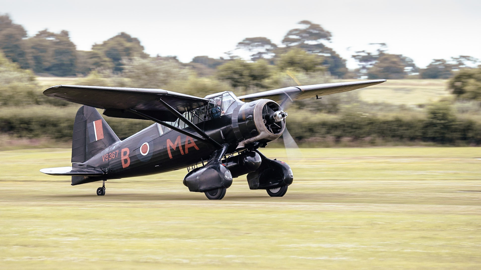 Old Warden, UK - 3rd July 2022: A vintage Westland Lysander world war 2 recconaissance aircraft lands on grass airfield