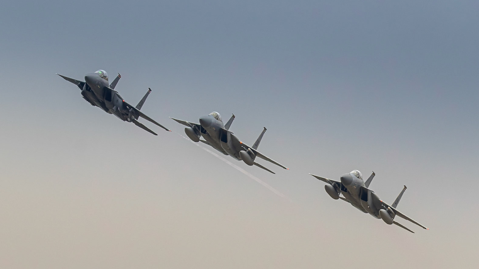 Fairford, UK - 15th July 2017: Formation of three USAF F15 Fighter jets in flight