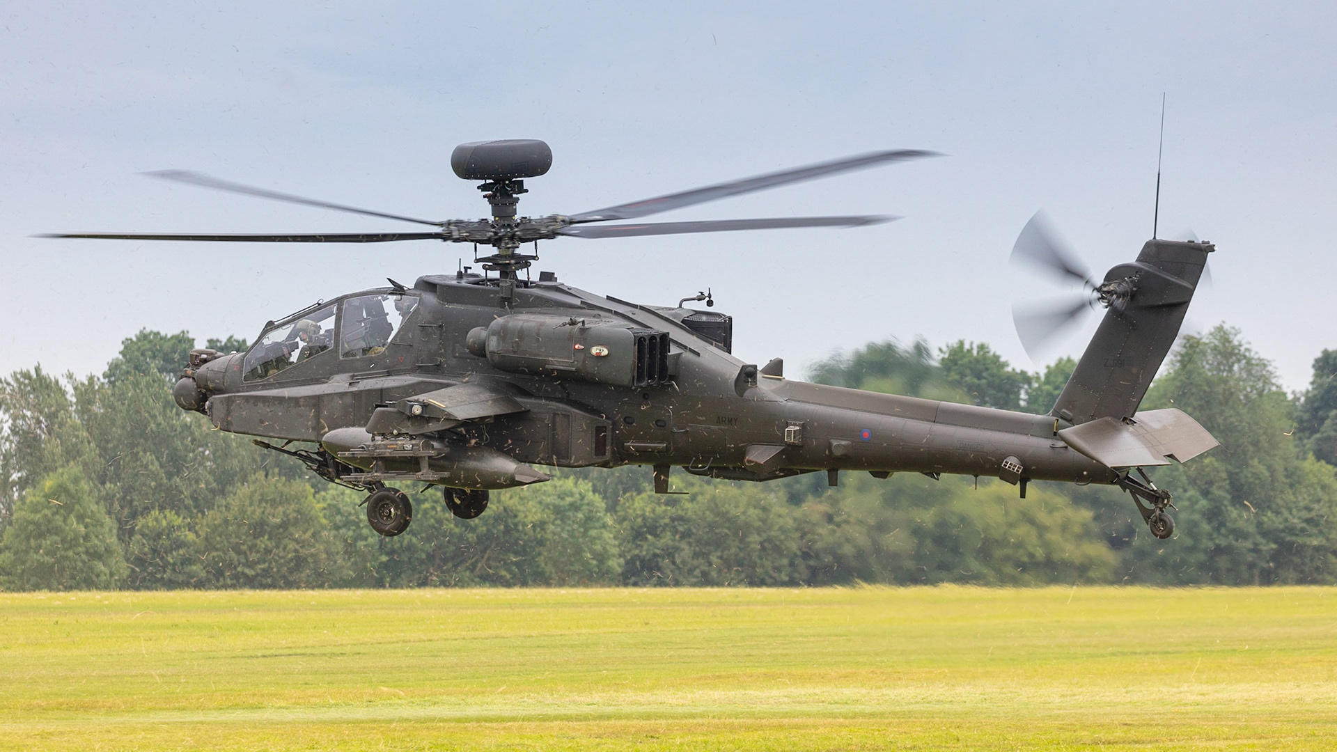 Old Warden, UK - 4th August 2019: A British Army Apache helicopter taking off from airfield