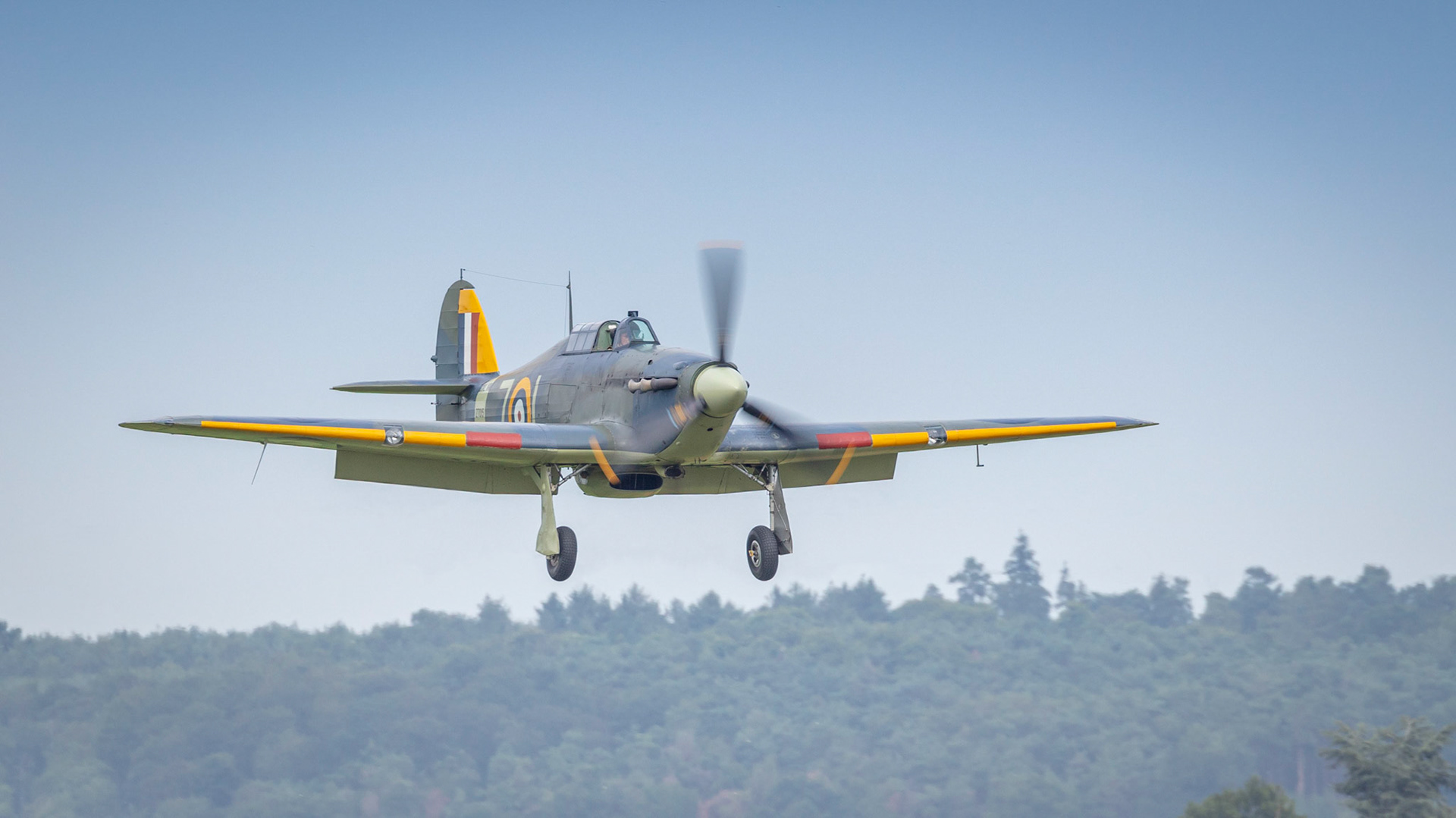 Old Warden, UK - 4th August 2019: A vintage WW2 Hawker Hurricane landing at airfield