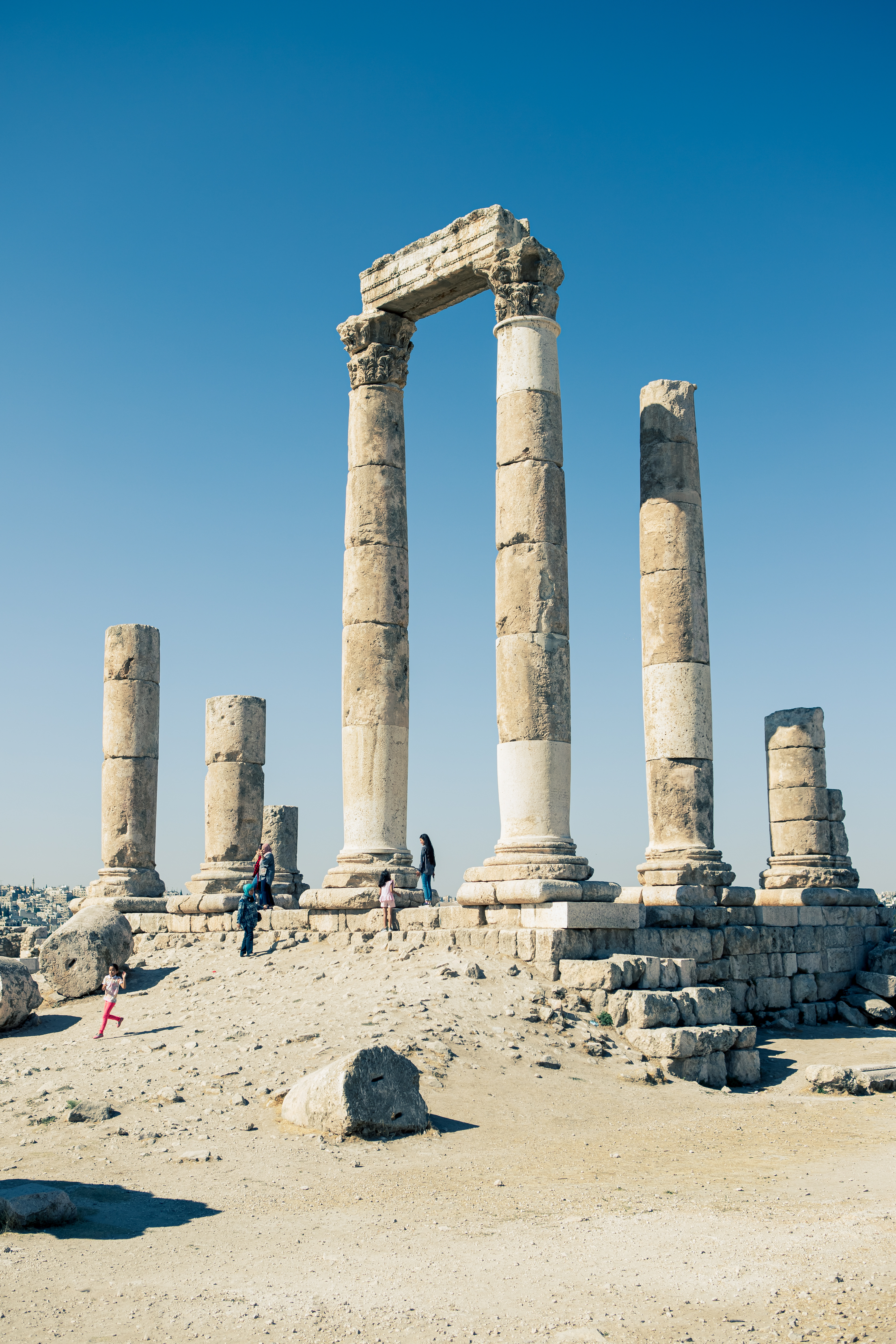 A Jordanian family visiting the Citadel ruins in Amman, Jordan on a national holiday. During the pandemic, Jordan encouraged its citizens to visit and engage with the historical sites throughout Jordan which were previously mostly tourist attractions.