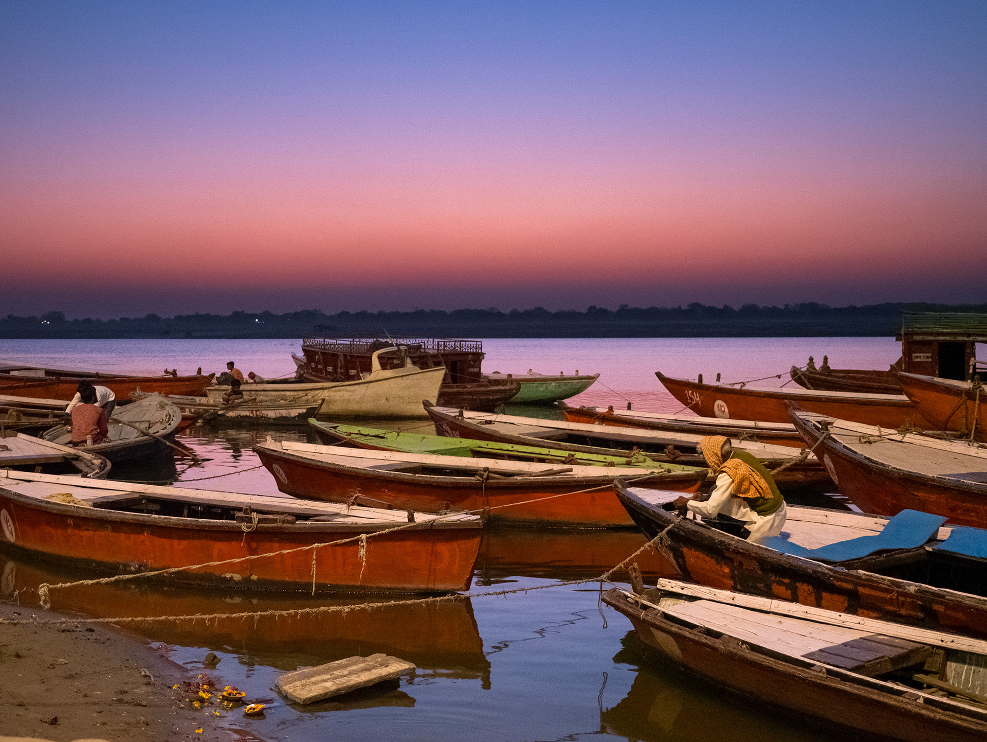 Boats on the shore of the Ganges River at sunrise, Varanasi, India {030517_Varanasi_263}