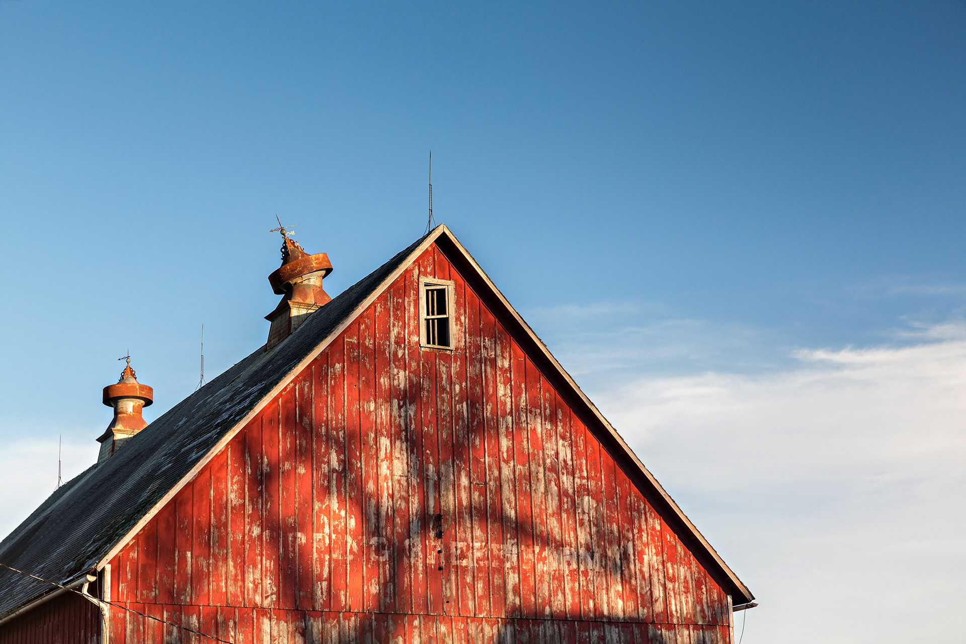 Red barn with the the shadow of a tree, Iowa {102017_Plagge_1066}