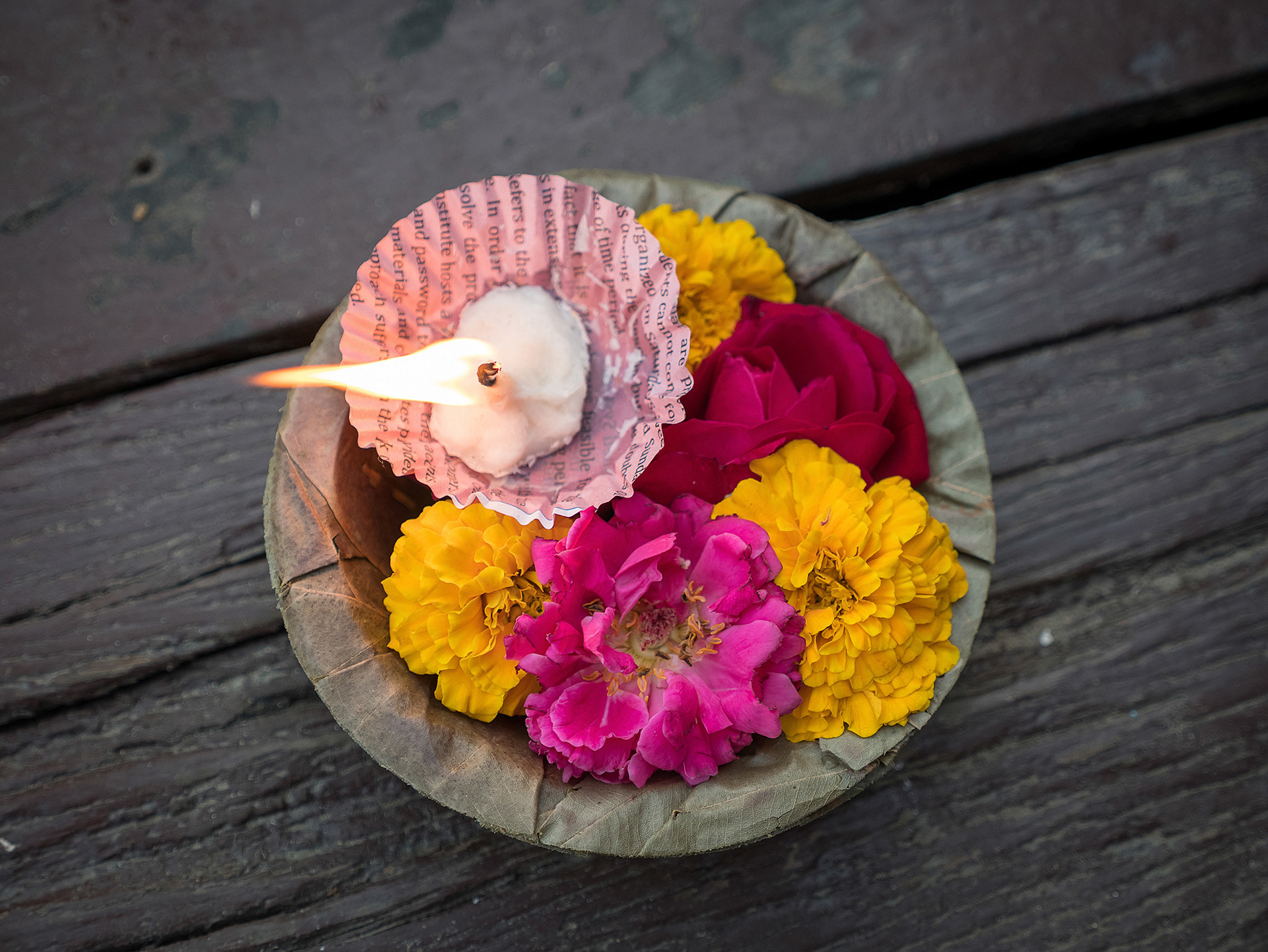 Beautiful flower and candle offering for the Ganges River, Varanasi, India {030517_Varanasi_391}
