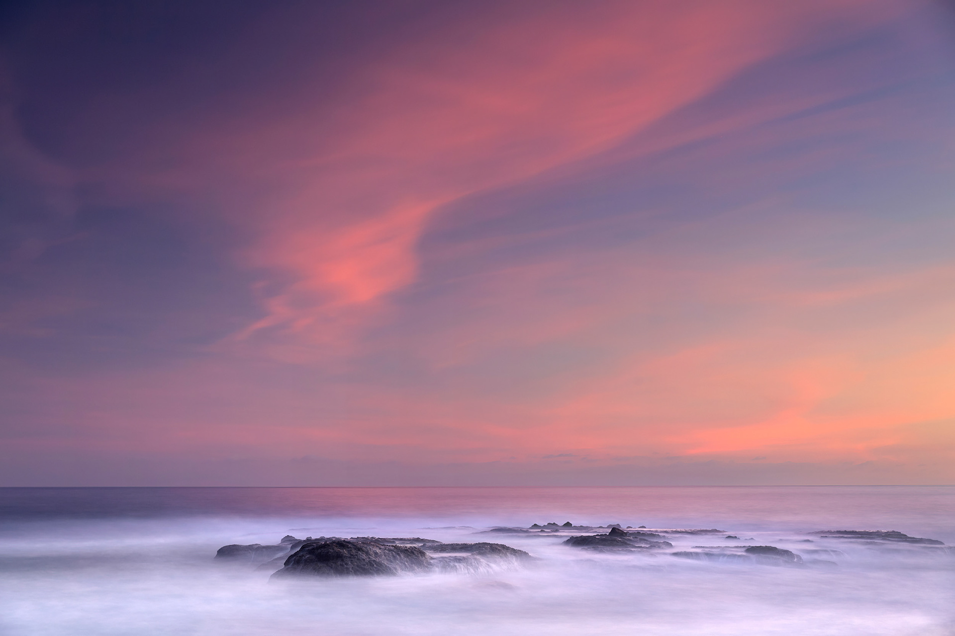 Misty waves crashing over rocks during sunset at Treasure Island Beach, Laguna Beach, CA {011018_Treasure_Island_29}