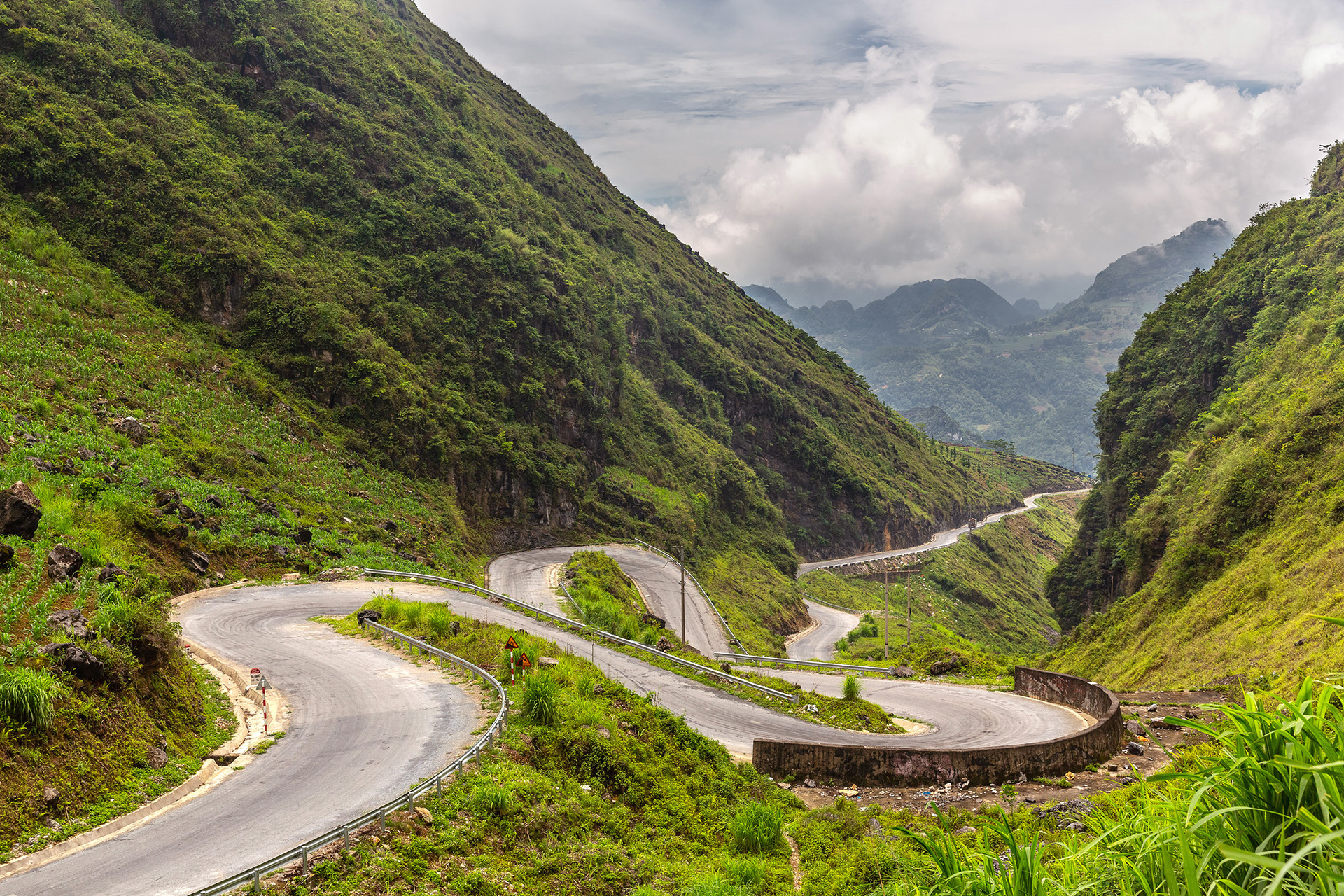 Winding road through the mountains of Ha Giang, Vietnam {052718_HaGiang_152}