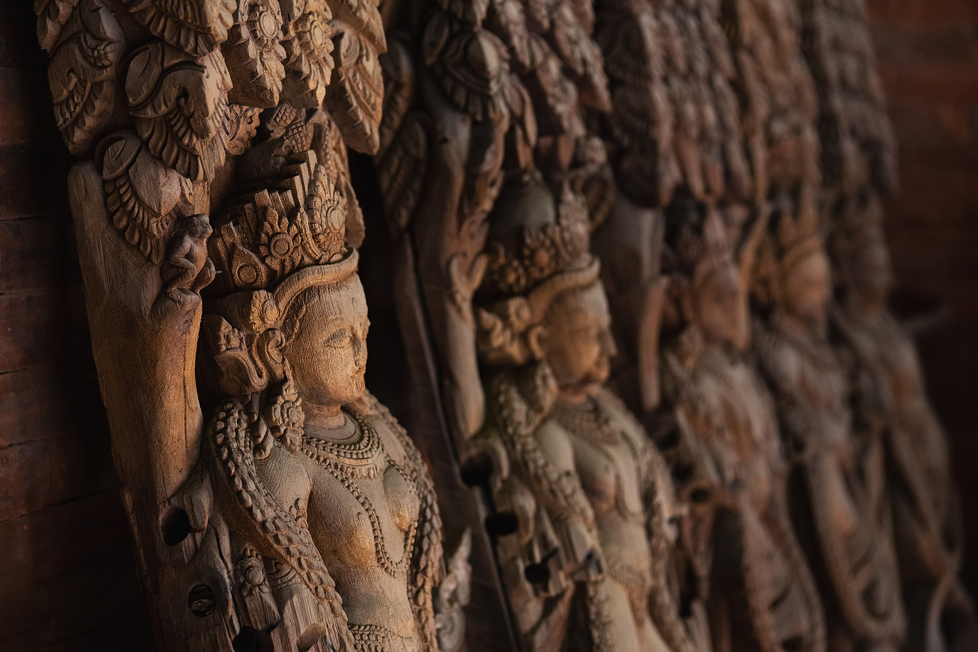 Wooden carved sculptures in Patan, Nepal {040118_Nepal_2500}