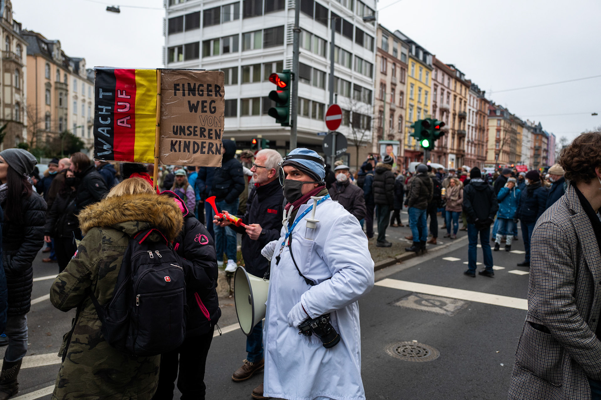 Supporters of the lateral thinking movement protest against the new requirements and measures against the spread of covid-19 infections, in Frankfurt am Main, Germany, 15 January 2022.  EPA/Constantin Zinn