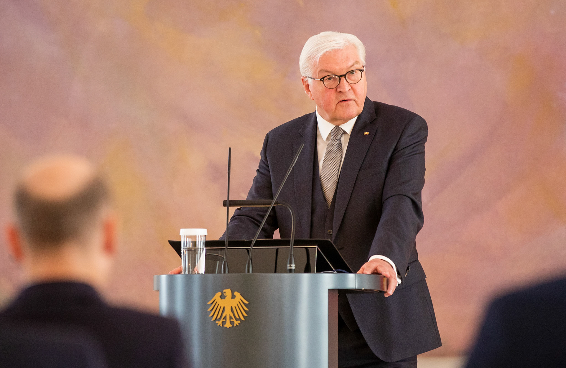 German President Frank-Walter Steinmeier speaks during a ceremony to award the Cross of Merit with star  to German politician of the Christian Democratic Union (CDU) Volker Kauder at Bellevue Palace in Berlin, Germany, 11 April 2022. Kauder was head of the CDU/CSU parliamentary group from 2005 to 2018. The Order of Merit of the Federal Republic of Germany is awarded by the President to honor achievements of 'particular value to society'.