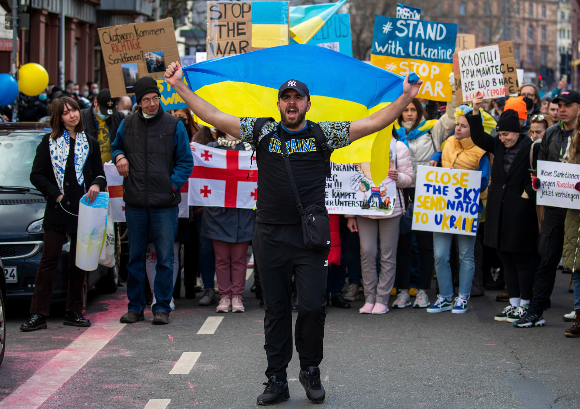 People protest against Russia's military operation in Ukraine in front of the Russian consulate in Frankfurt am Main, Germany, 26 February 2022. Russian troops launched a major military operation on Ukraine on 24 February, after weeks of intense diplomacy and the imposition of Western sanctions on Russia aimed at preventing an armed conflict in Ukraine.