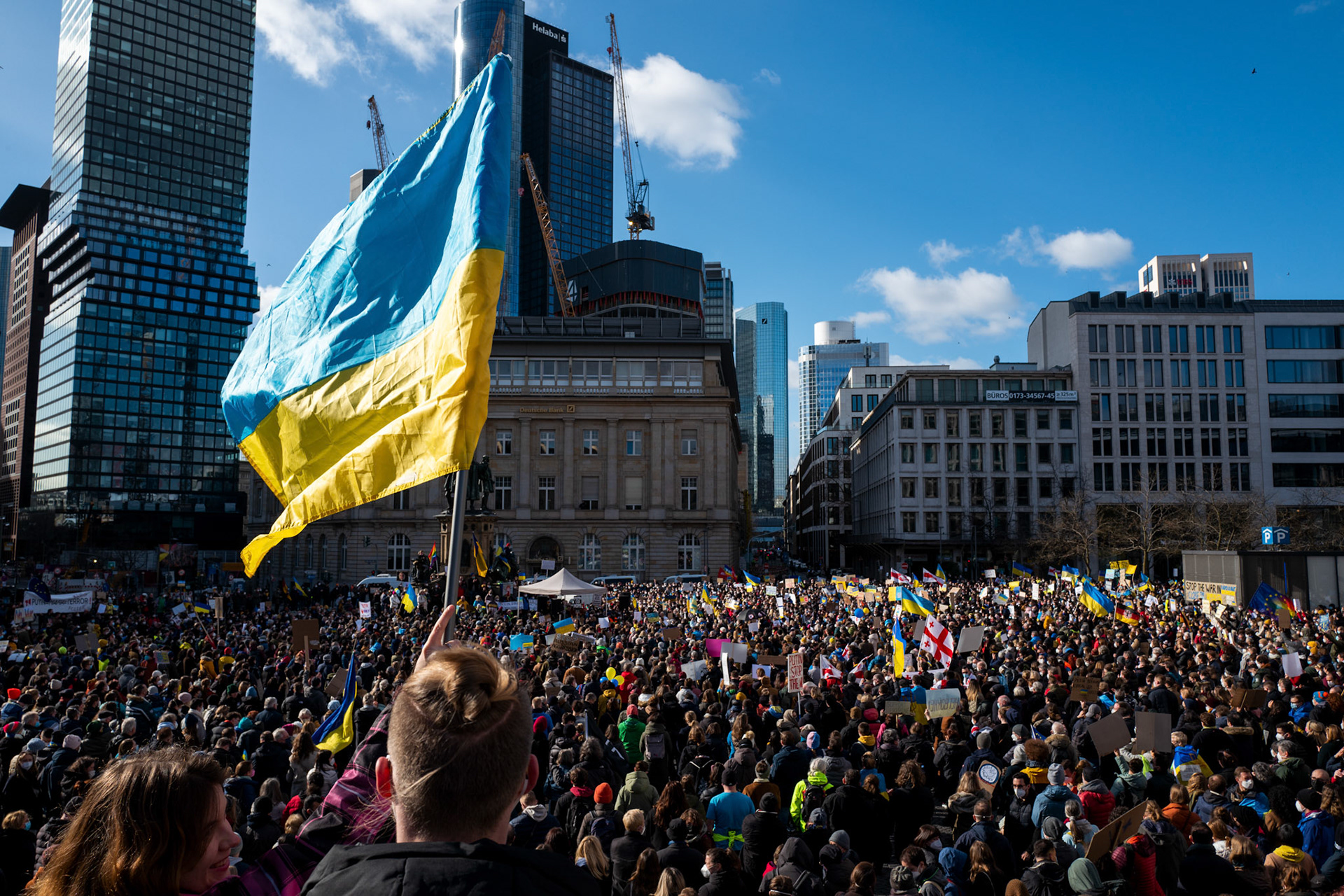 People take part in a demonstration against Russia's military operation in Ukraine, at Rathenau square in Frankfurt am Main, Germany, 26 February 2022. Russian troops launched a major military operation on Ukraine on 24 February, after weeks of intense diplomacy and the imposition of Western sanctions on Russia aimed at preventing an armed conflict in Ukraine.