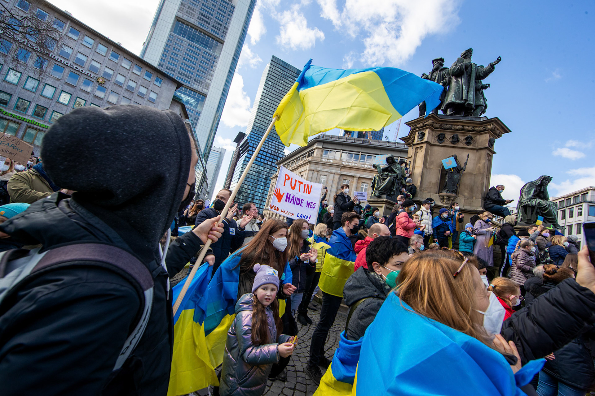 People protest against Russia's military operation in Ukraine at Rathenau place in Frankfurt am Main, Germany, 26 February 2022. Russian troops launched a major military operation on Ukraine on 24 February, after weeks of intense diplomacy and the imposition of Western sanctions on Russia aimed at preventing an armed conflict in Ukraine.