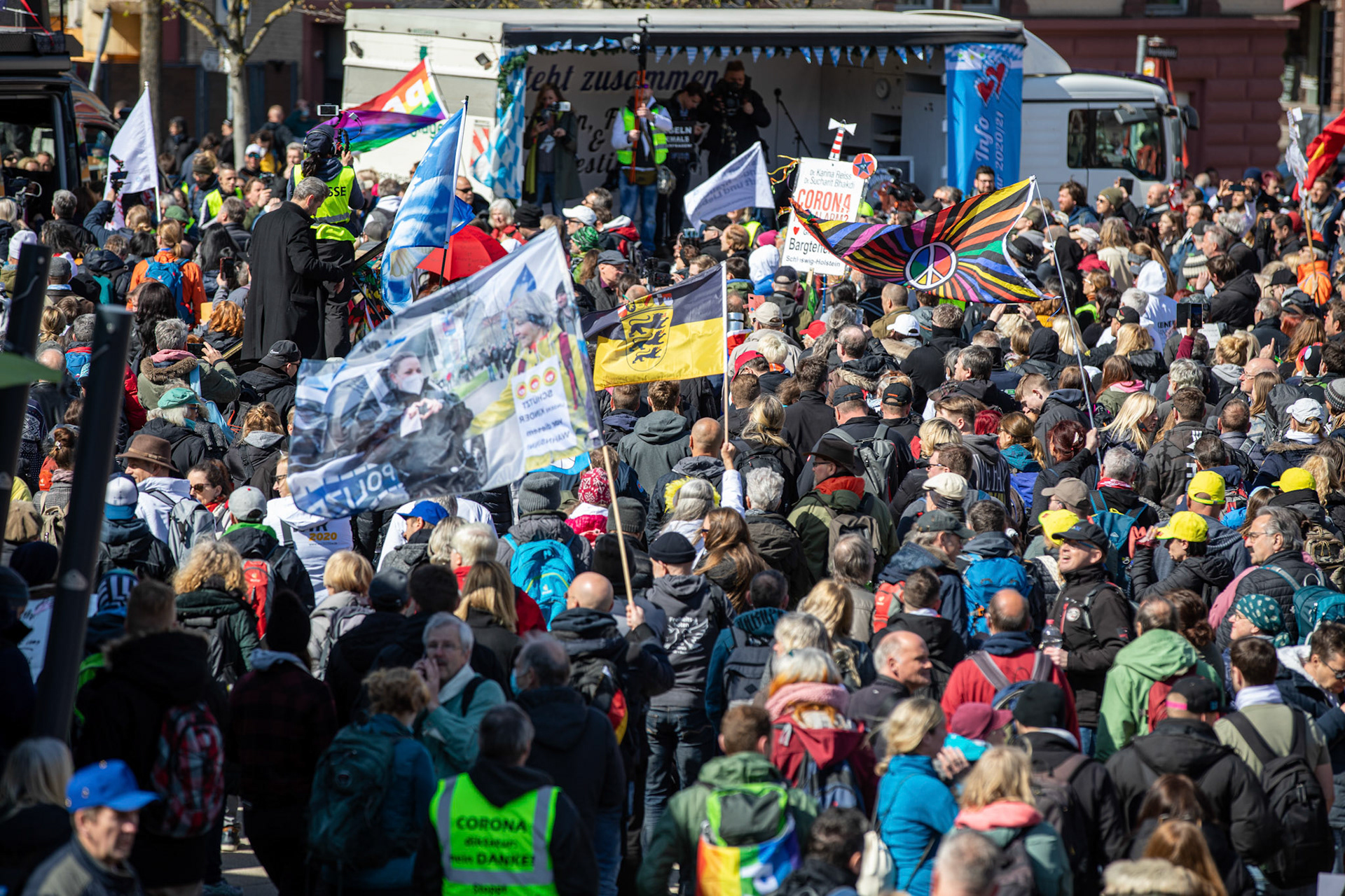 People take part in a demonstration held by the 'Querdenker' (lateral thinkers) movement against the German government's coronavirus restrictions in Stuttgart, Germany, 03 April 2021. Stuttgart is the center of the 'Querdenker' movement, founded by entrepreneur Michael Ballweg, as the broadest possible grouping against the government's COVID-19 measures. The police is deployed with several hundred units while thousands are protesting. EPA-EFE/CONSTANTIN ZINN
