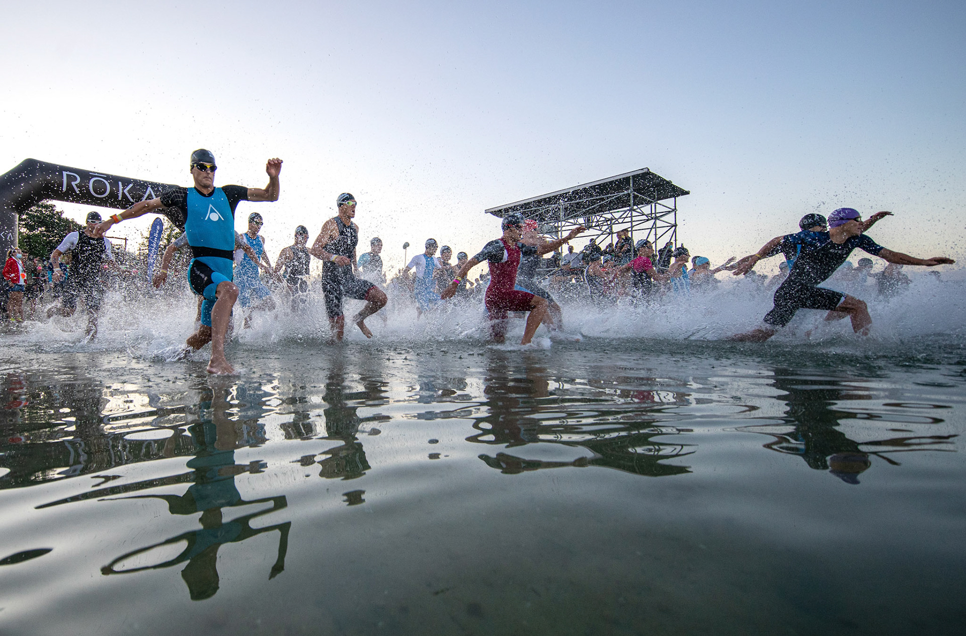 Athletes compete at the start of the Swimming portion of the Ironman European Championship 2022 at Forest Lake Langen near Frankfurt am Main, Germany, 15 August 2021.  EPA-EFE/Constantin Zinn