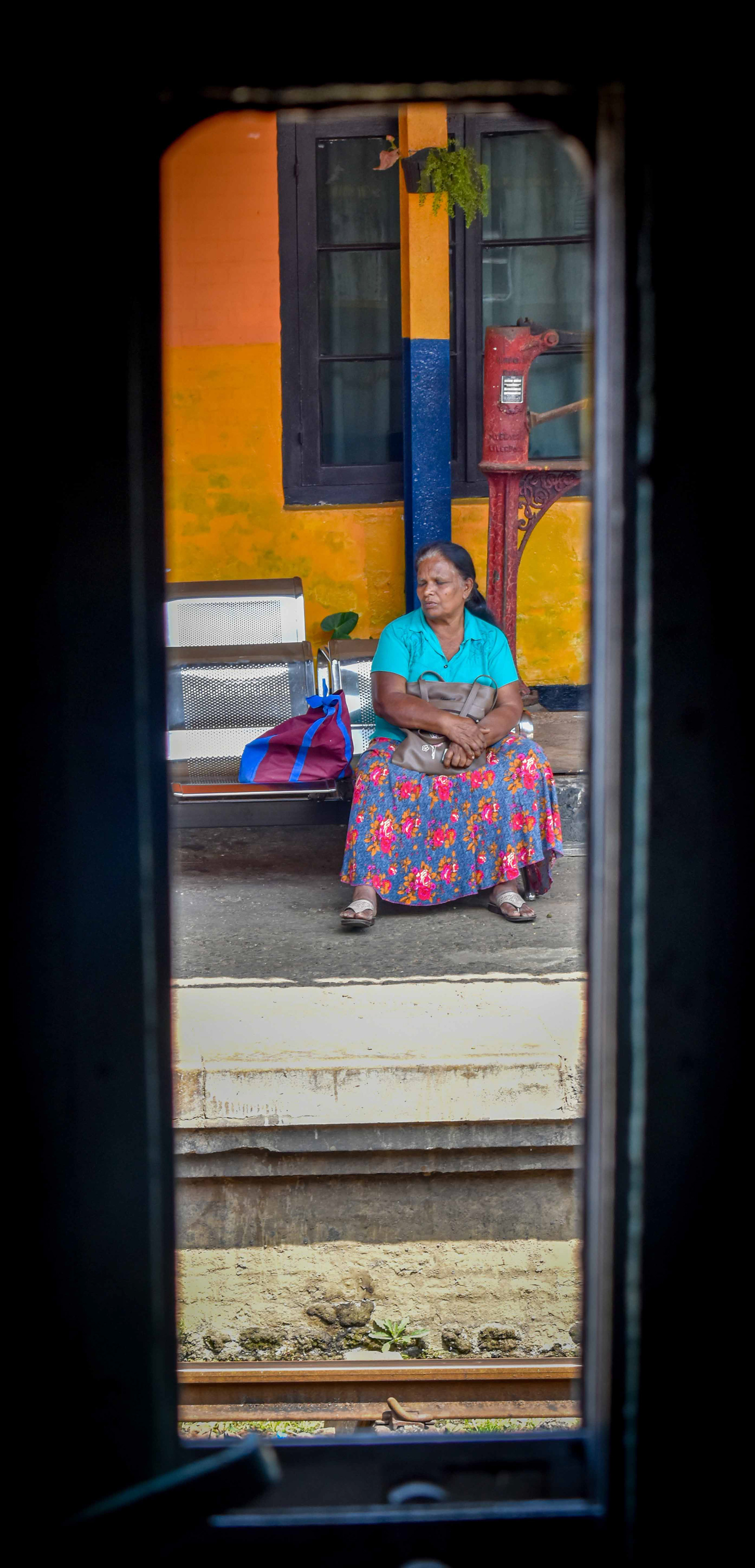 Framed portrait of a passenger through a cab window