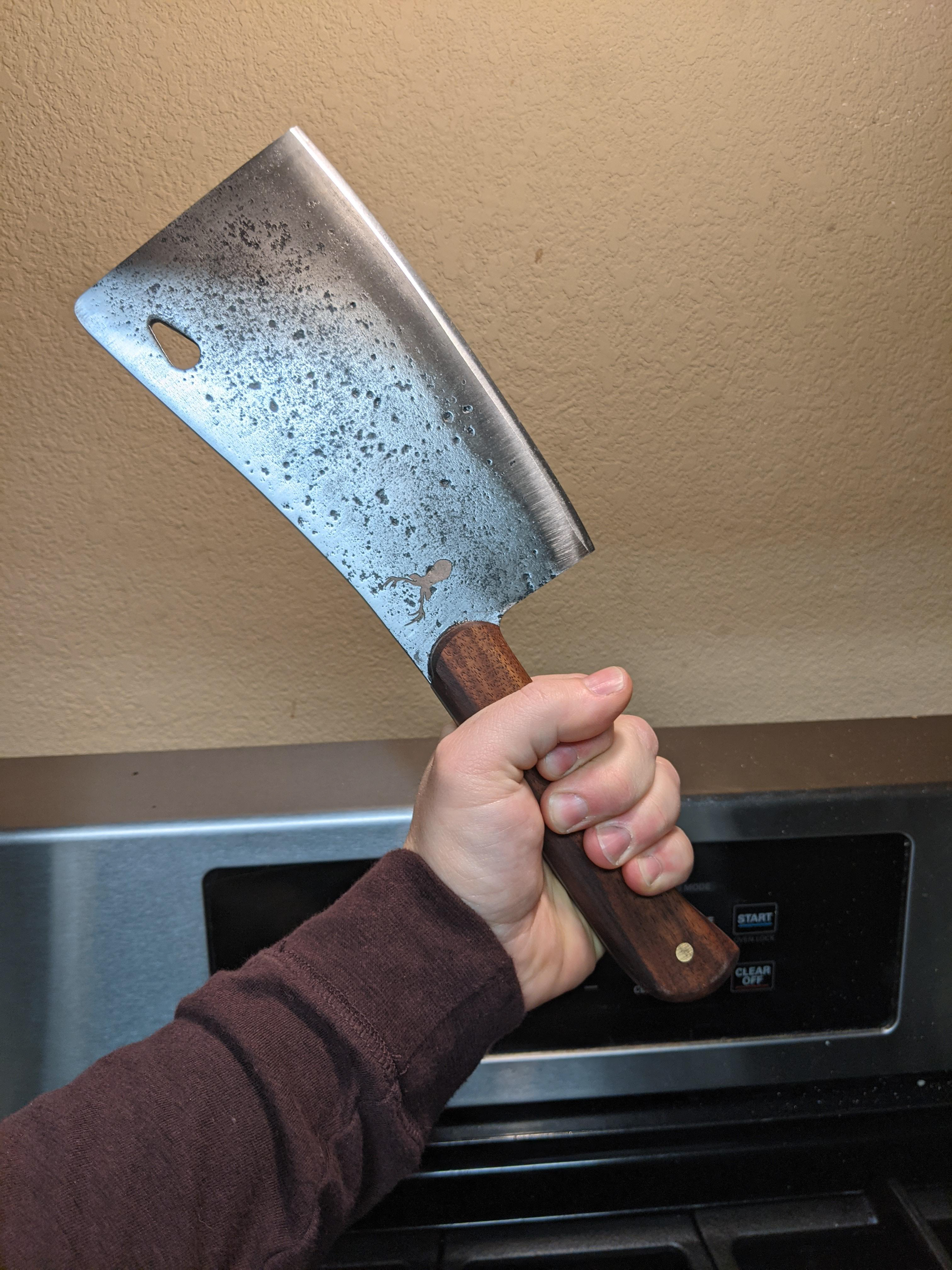 Restored 1885 Brinell of Crisfield cleaver with a deer silhouette engraved