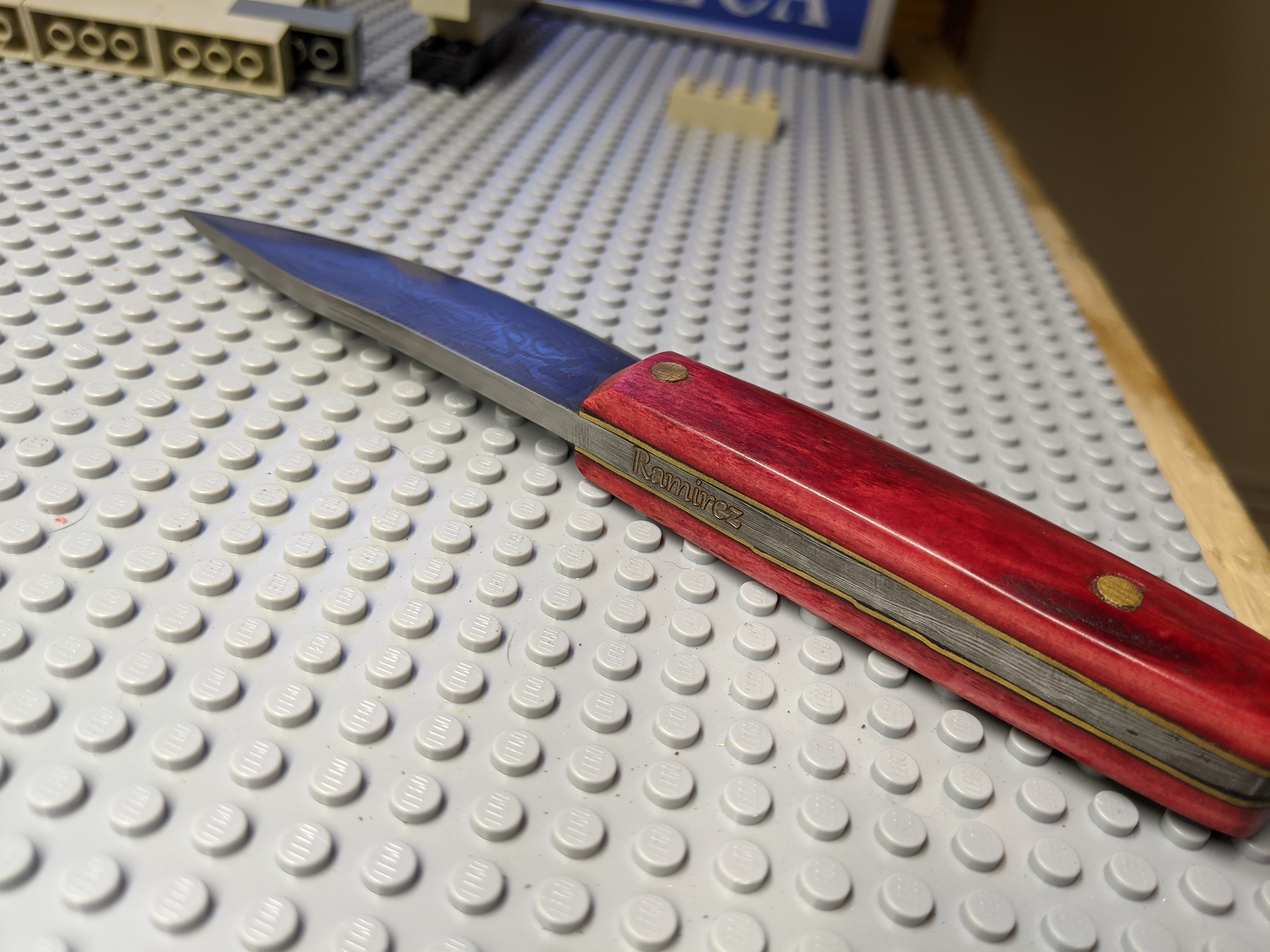 Custom name engraving on Damascus huntsman (knife made by @BrackinBladesForge)