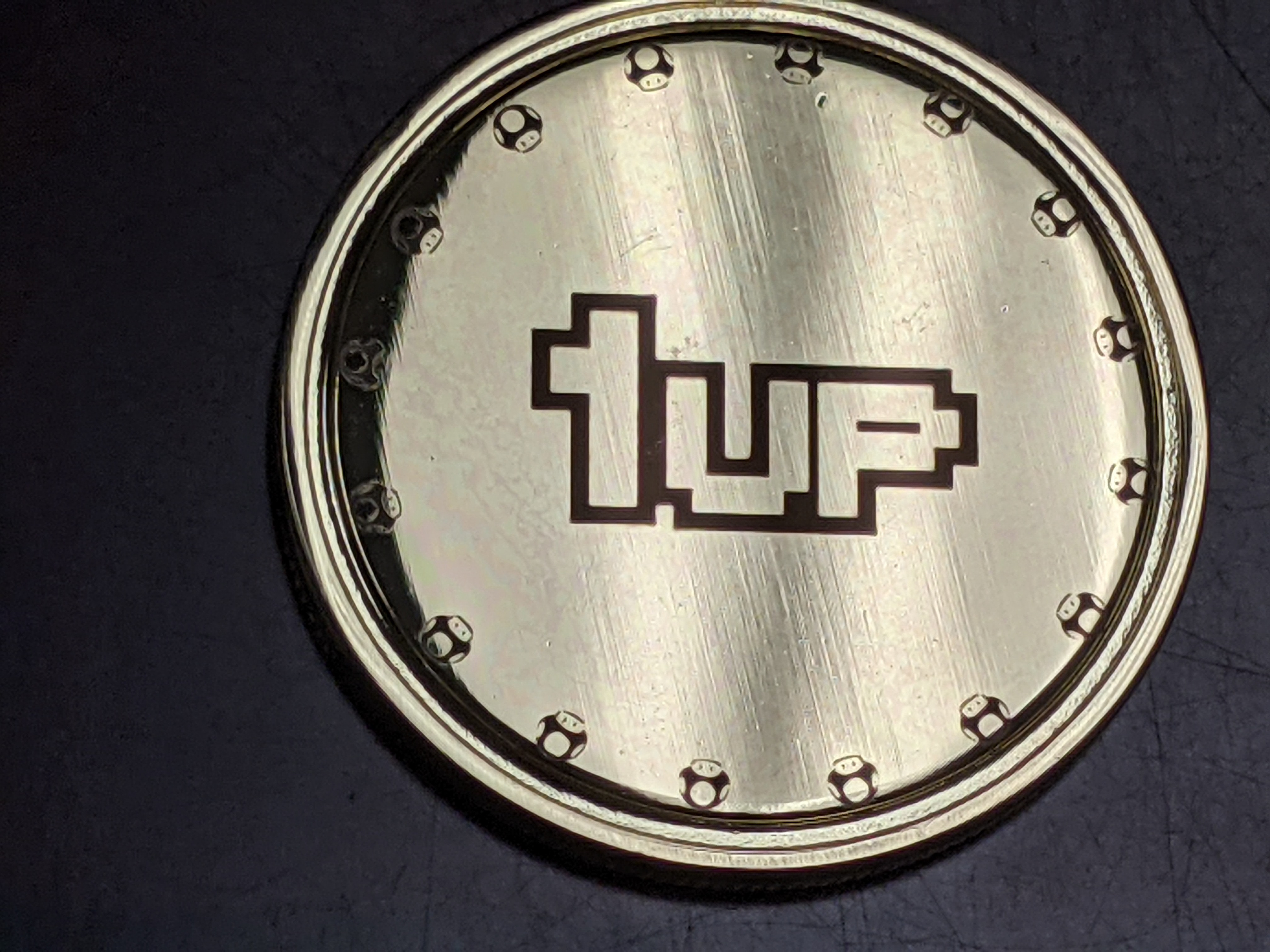 Grab a 1UP Coin from our store!