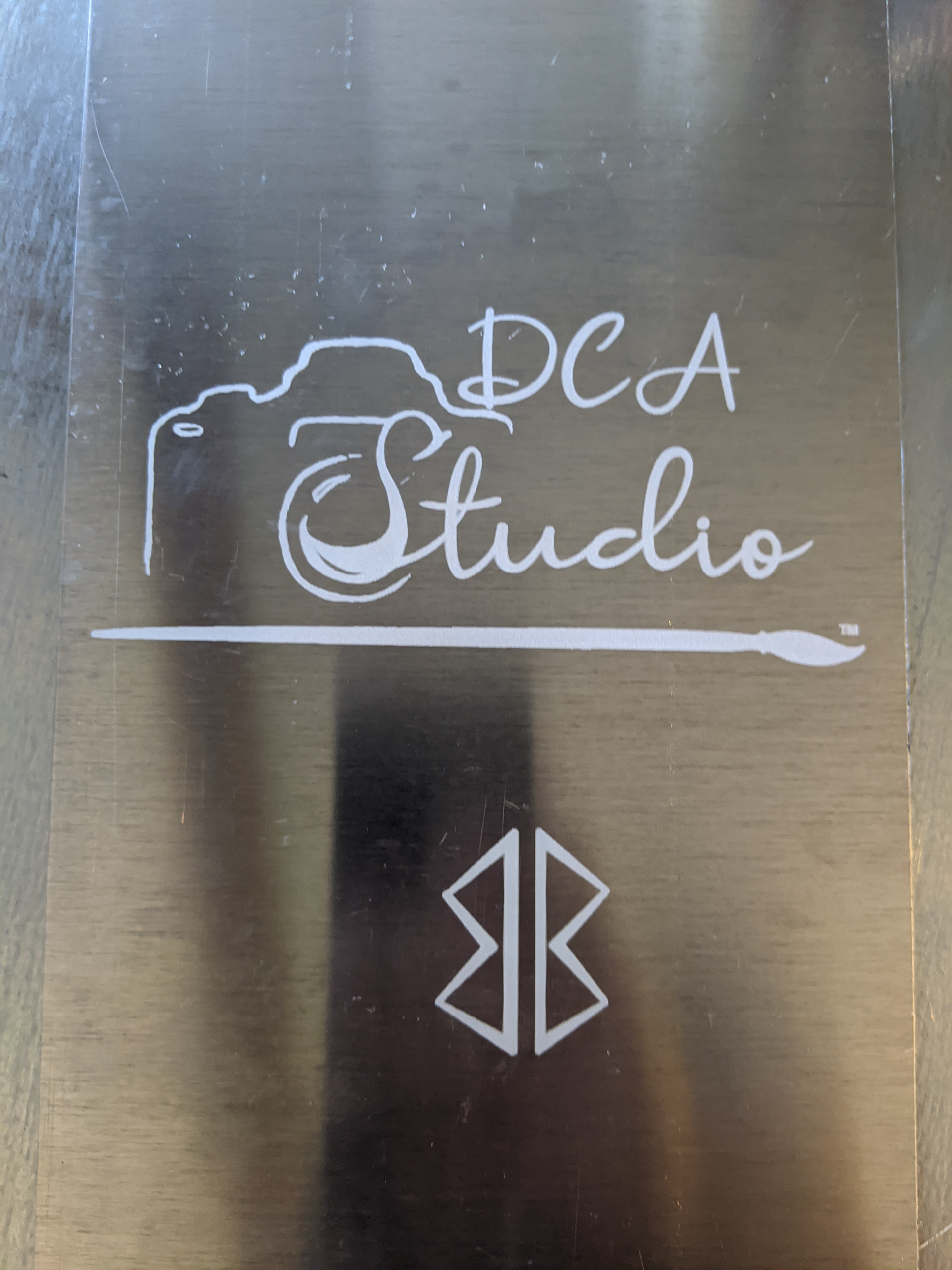 DCA Studio and Brackin Blades Forge Logos