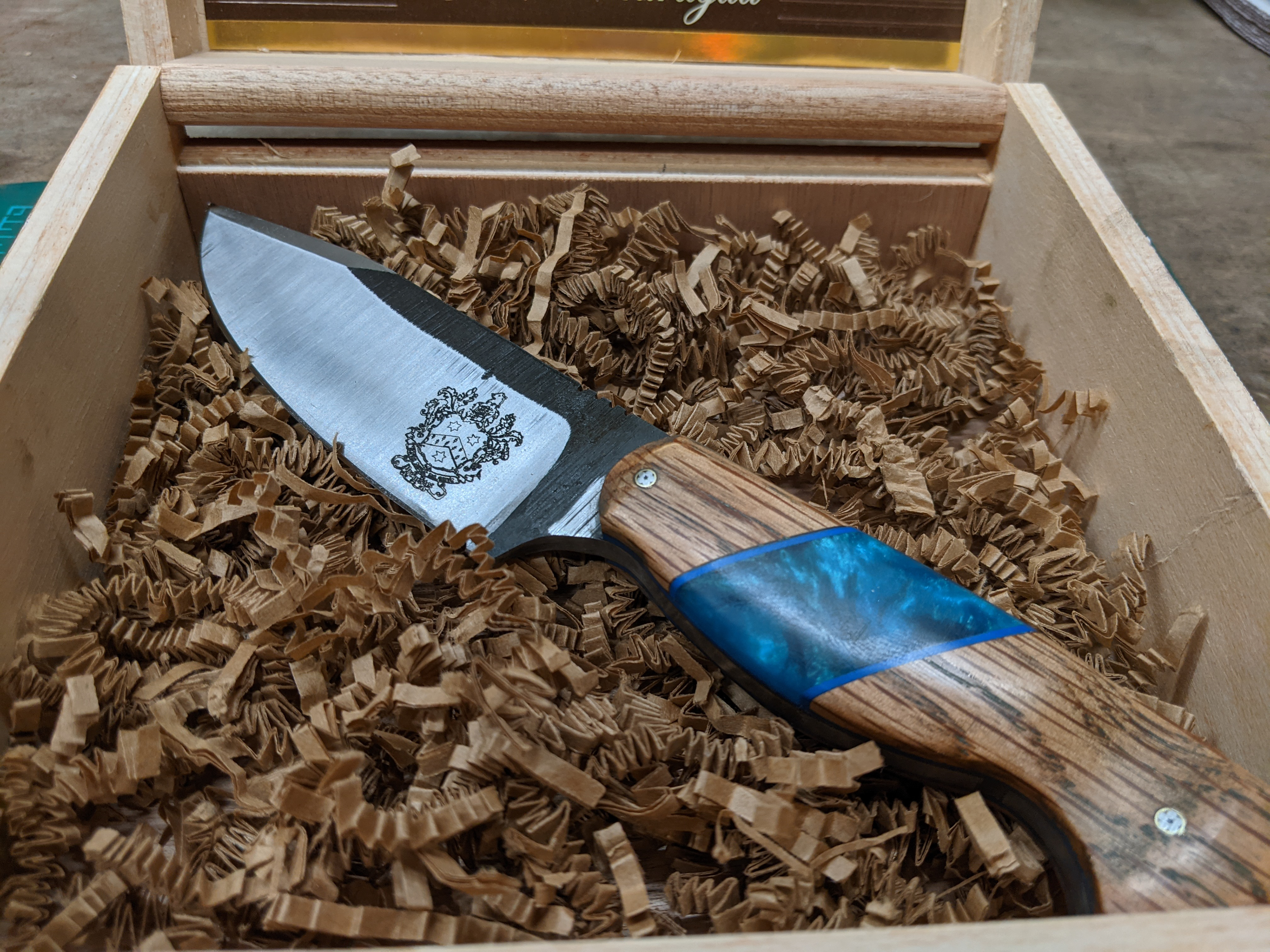 Family crest engraved on custom knife
