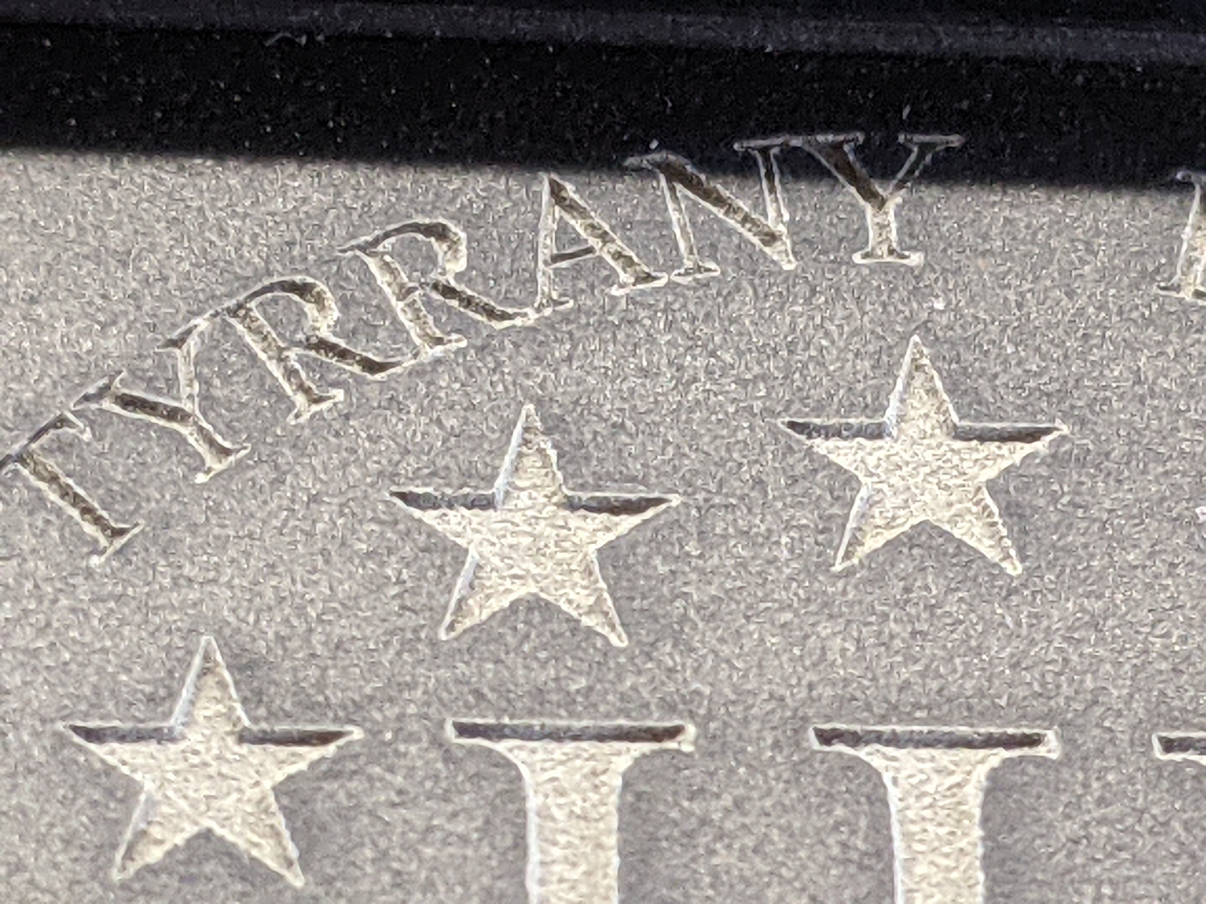 Closeup of Firearm Engraving (Click to Enlarge)