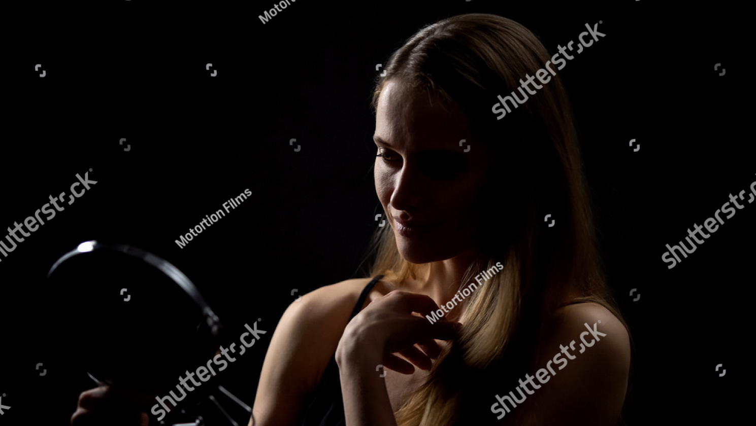 We love the lighting of the lady in this image