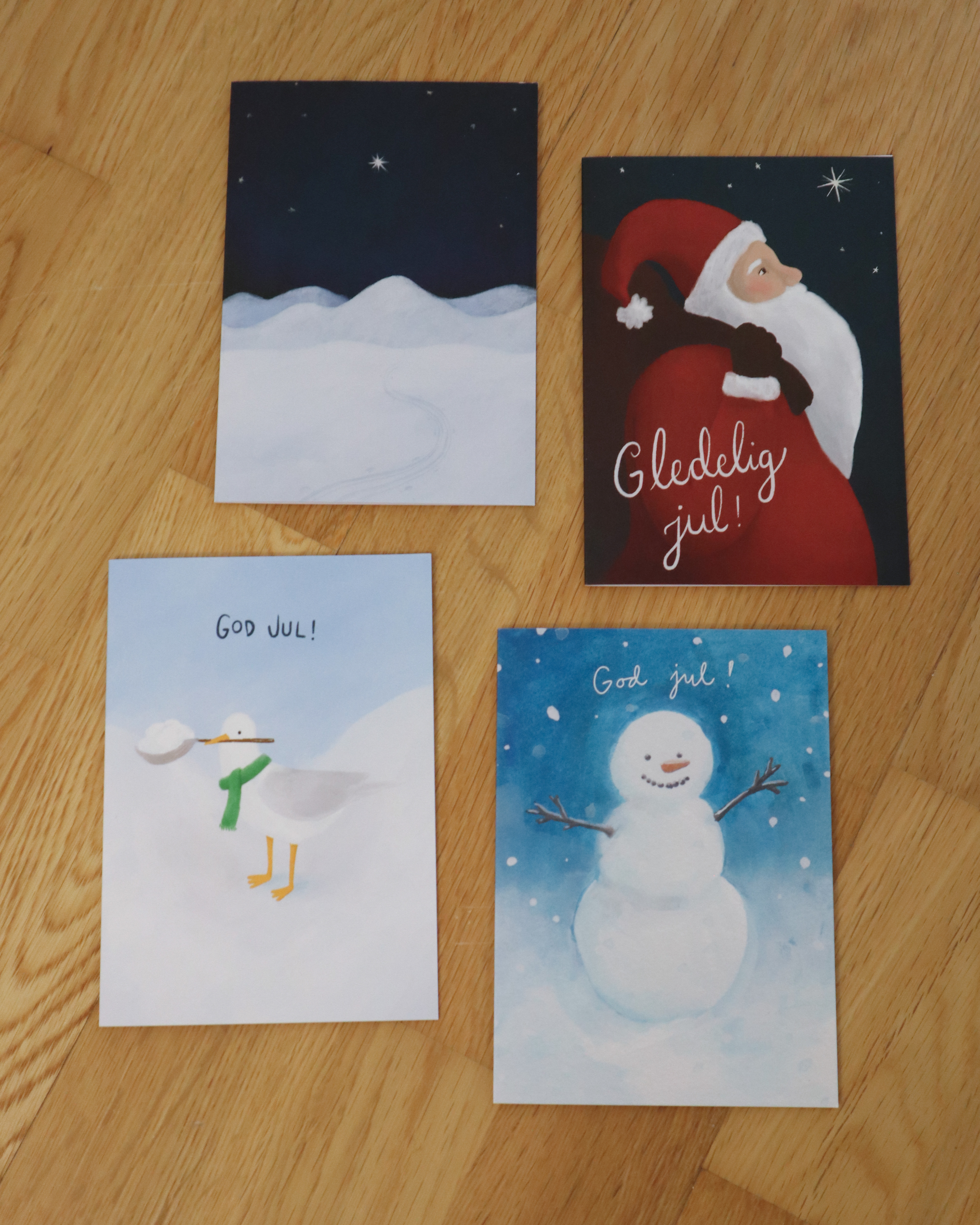 J-14 - Pakke med tre doble kort + konvolutter (velg selv hvilke, snømannen er nesten utsolgt) - 60 NOK