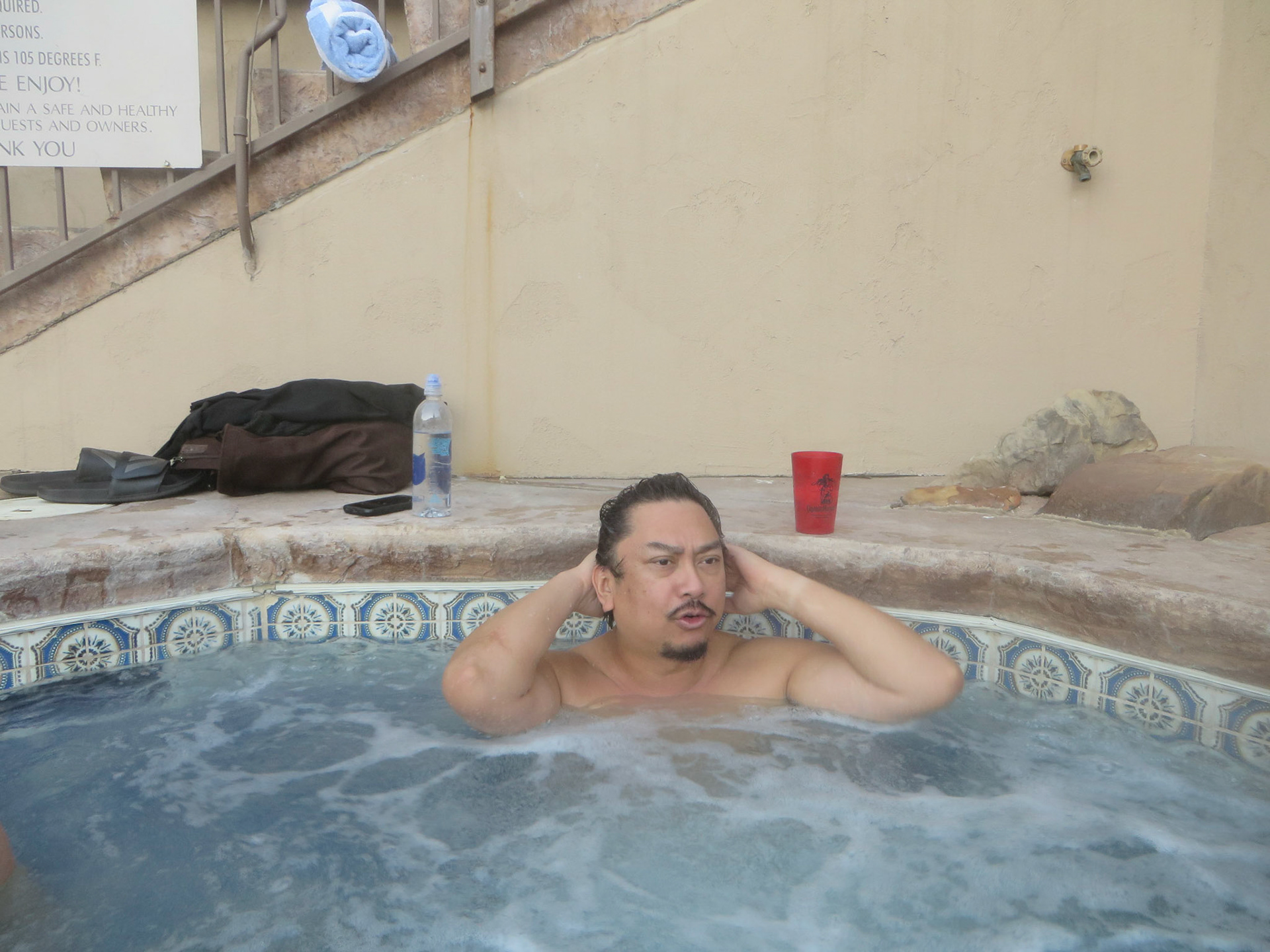 Alan enjoys the hot tub at Manor Vail