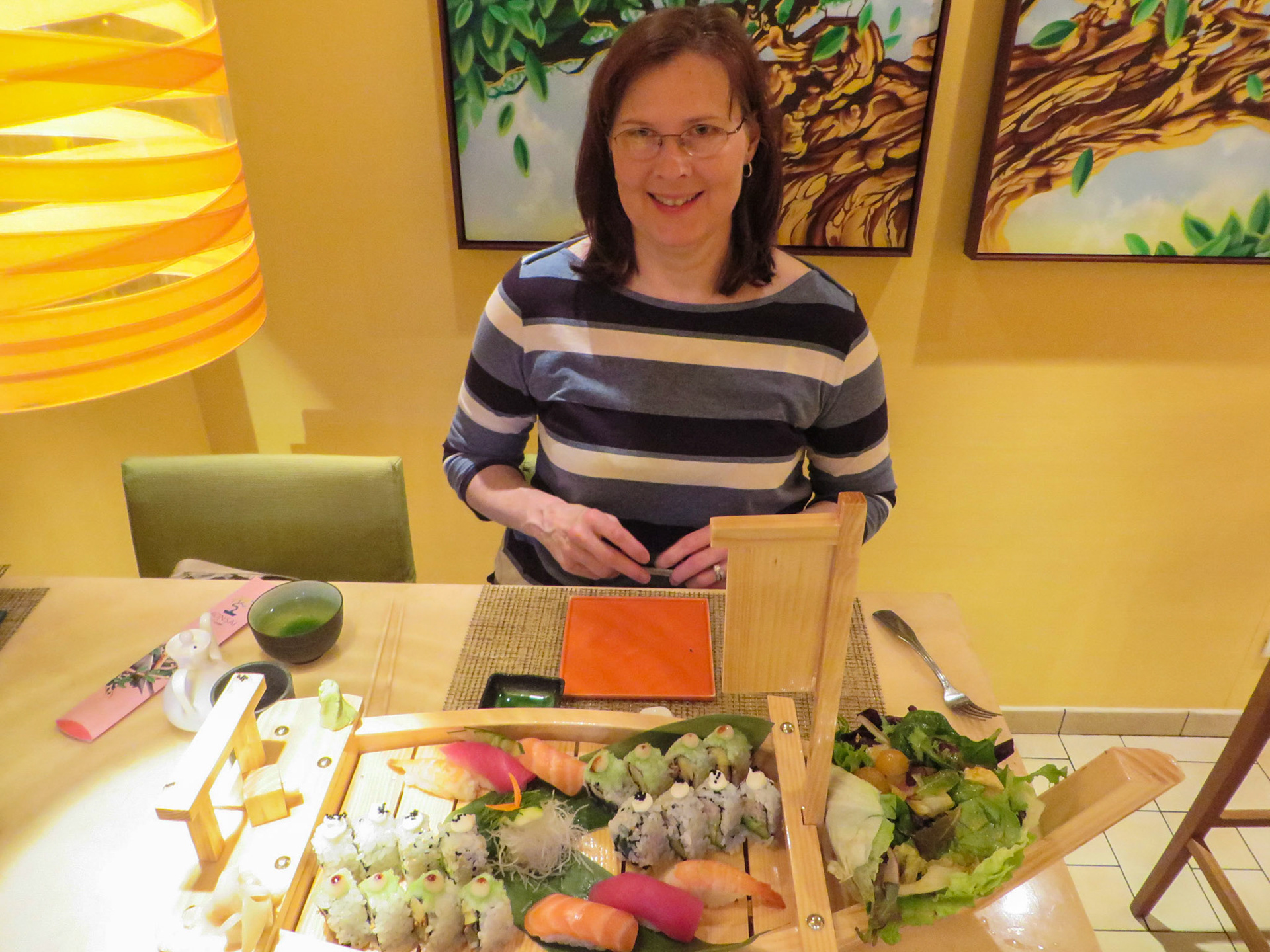 Michele shares a sushi boat for two in Bonsai