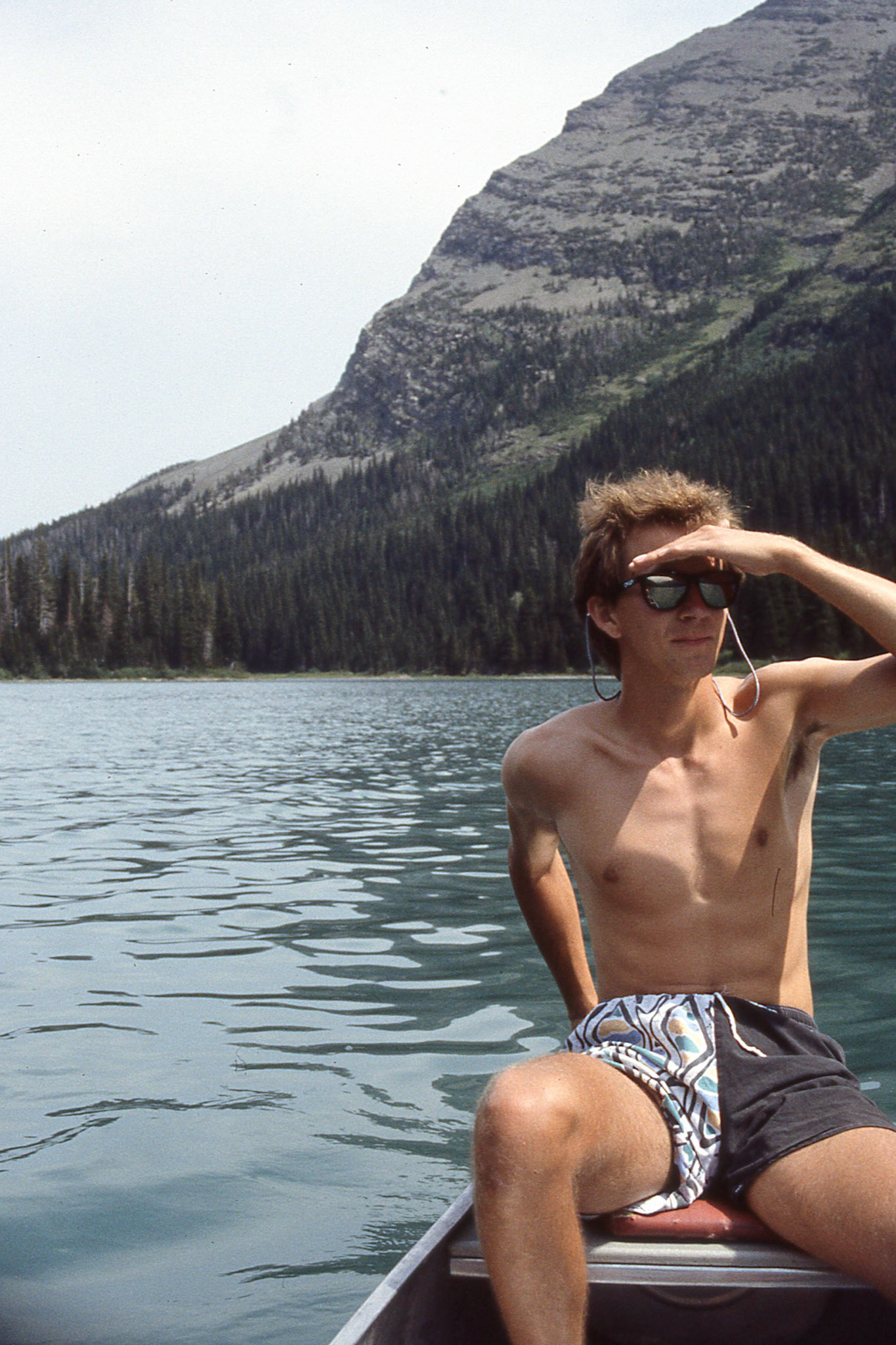 Nate canoeing along Swiftcurrent Lake