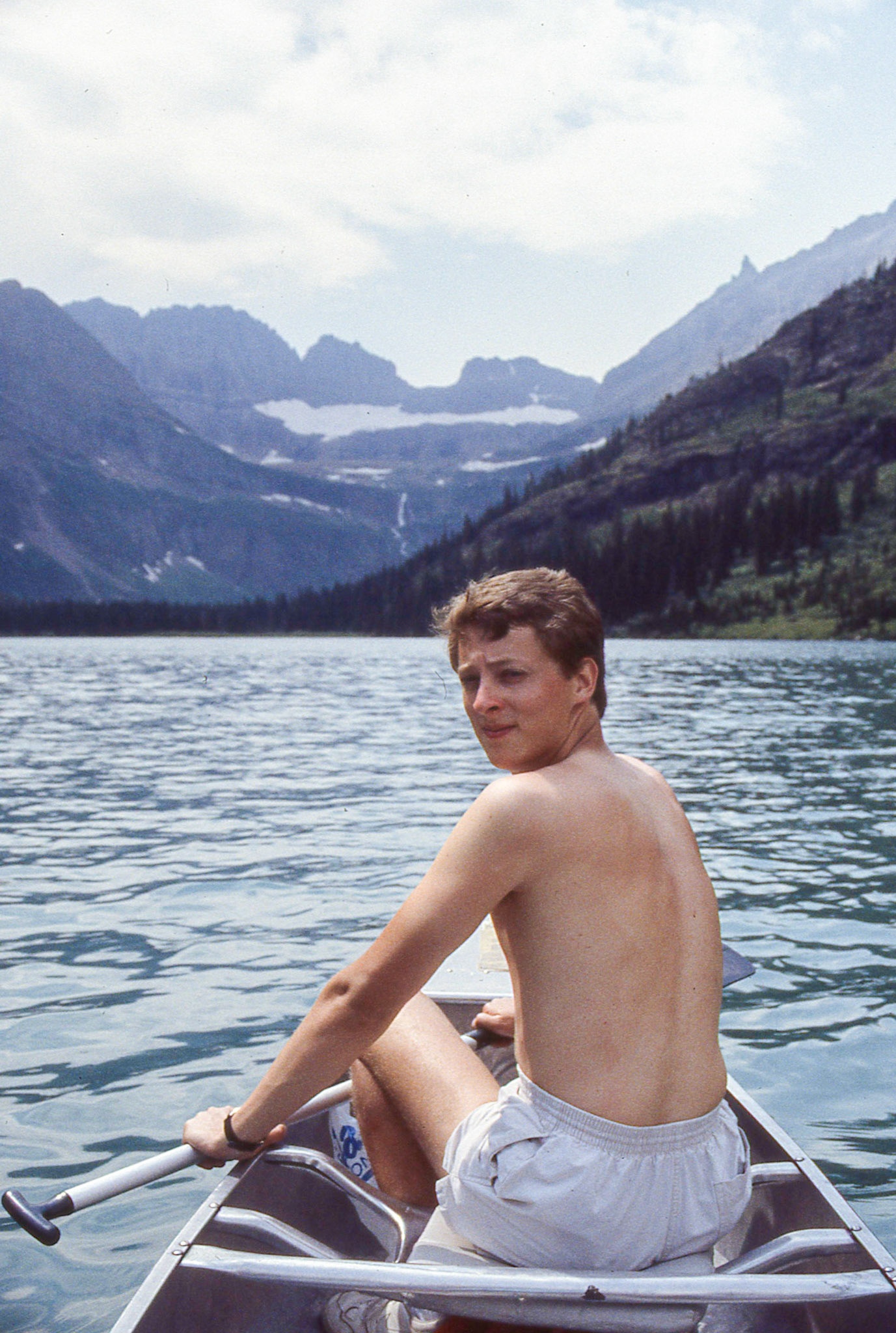 Barry canoeing along Swiftcurrent Lake