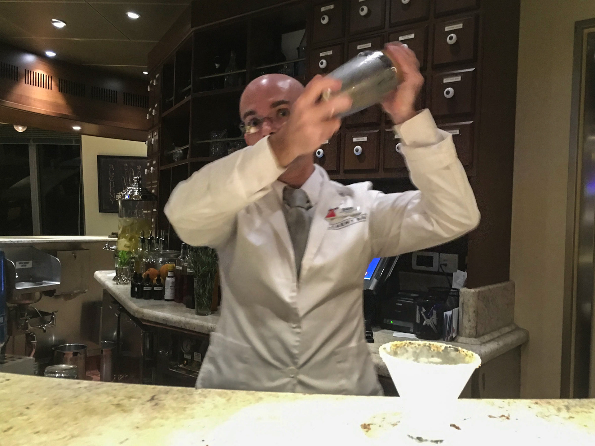 Dario mixes an Alchemist's Sidecar martini