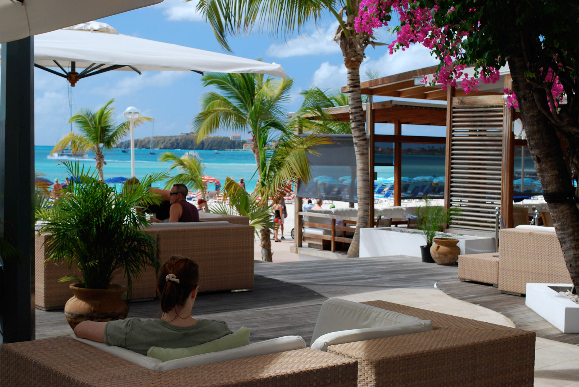 Michele enjoys the view from Holland House patio in St. Maarten