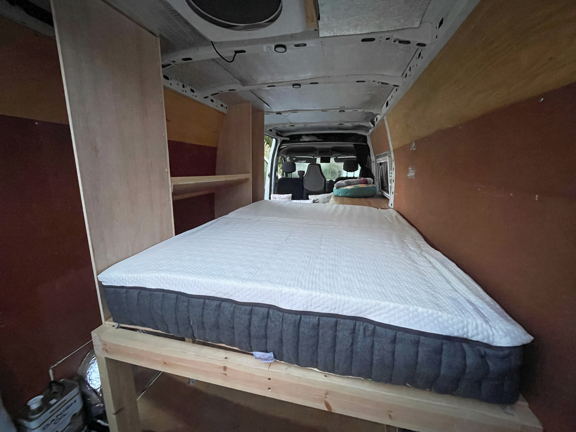 Some vertical storage for coats/wet gear at the back, clothes and some more taller storage. There will be a couple more shelves added! 