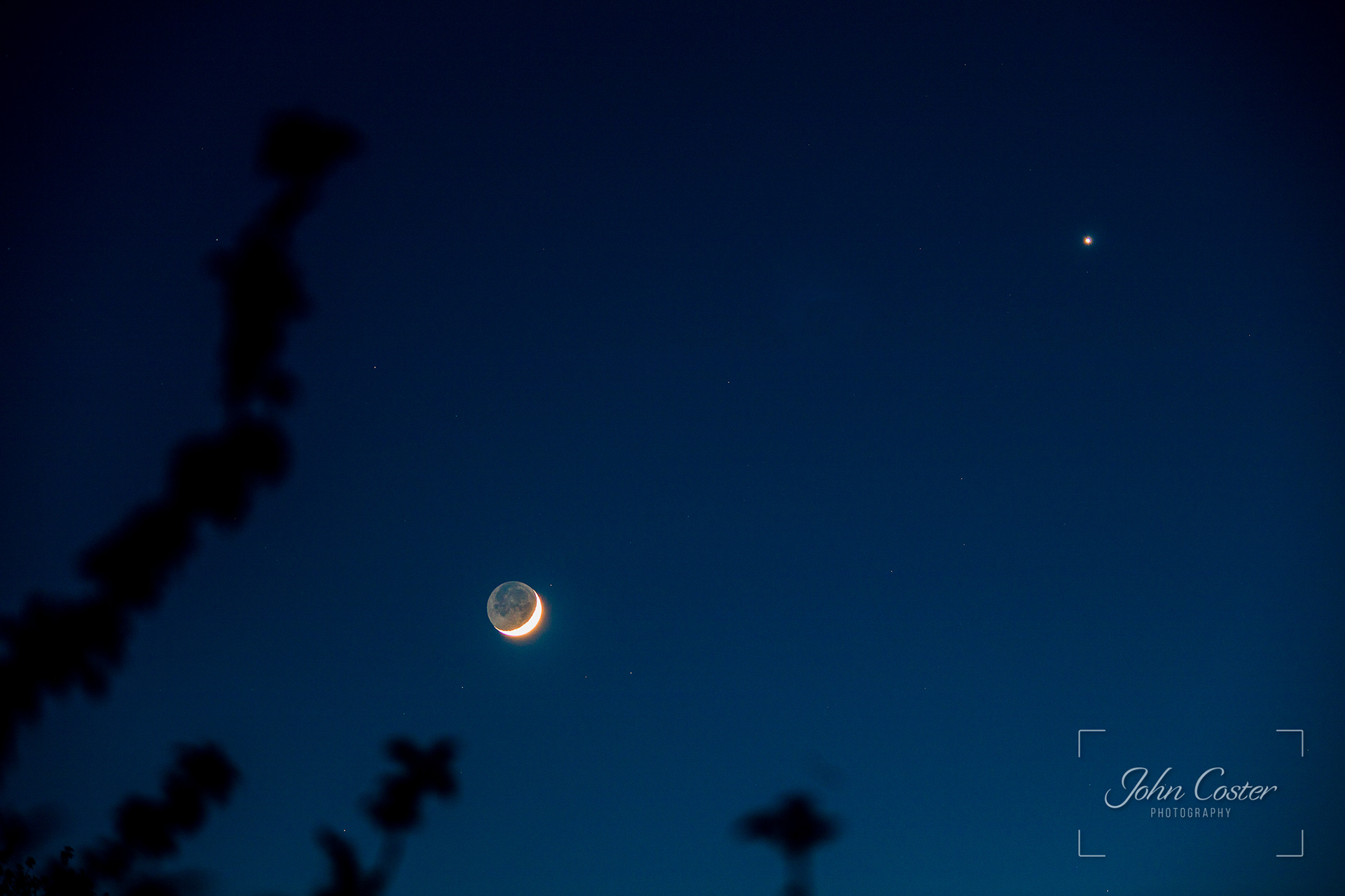 Moon and Venus at the end of the blue hour.