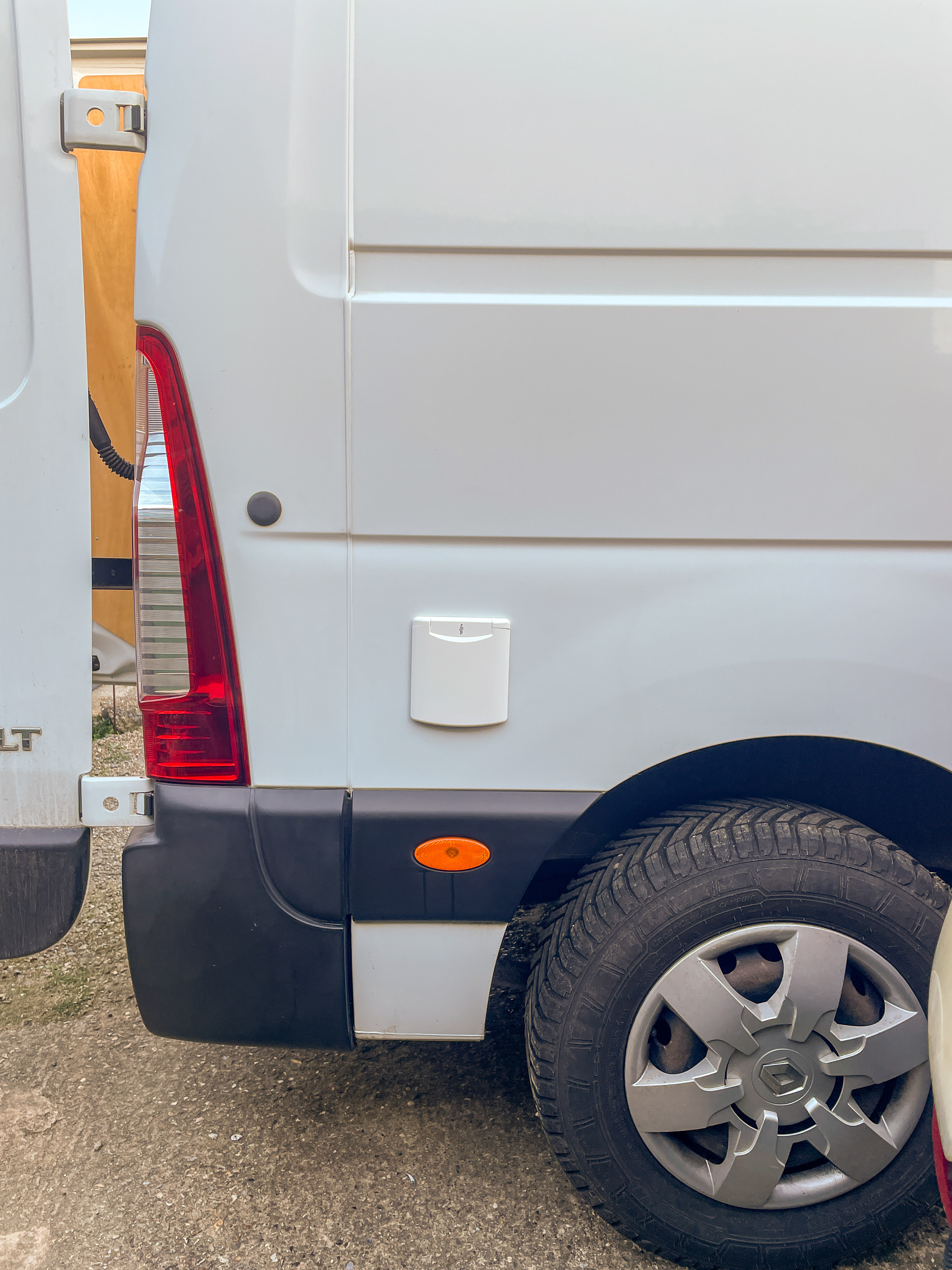 Power in!  Cutting this small round hole for the 16amp fitting was an anxious moment!! 