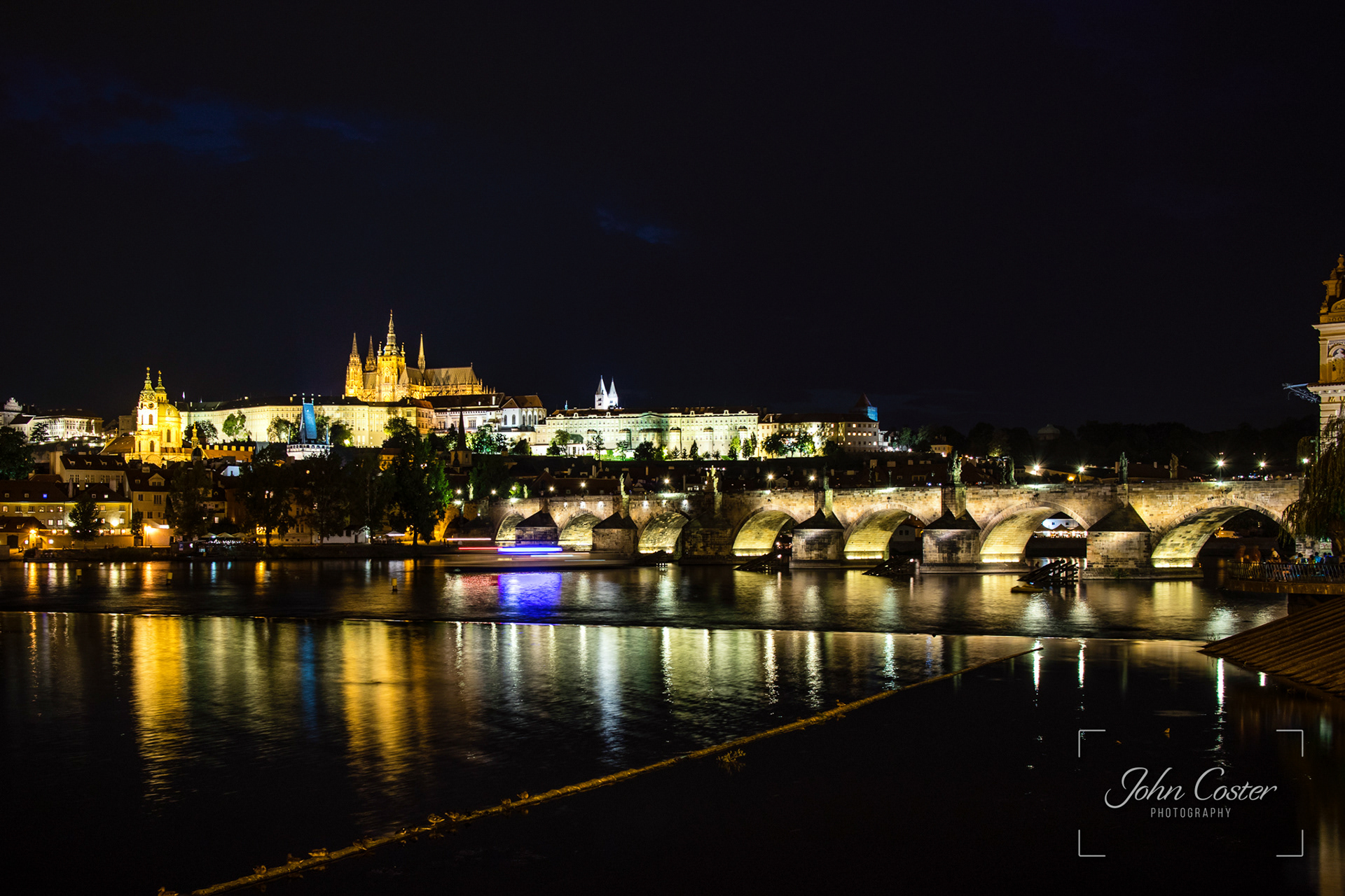 Charles Bridge linking Prague's Old & New Towns always crowded with tourists, street artists & entertainers.