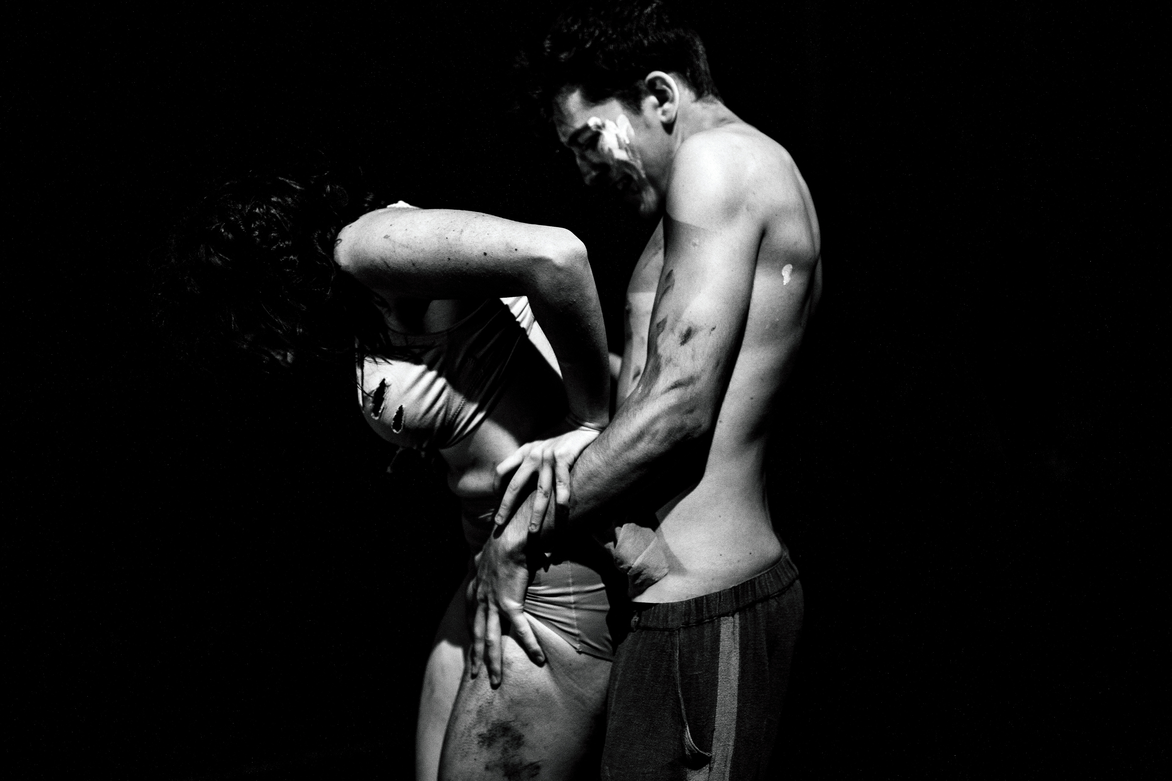 Actors performing on a theater stage