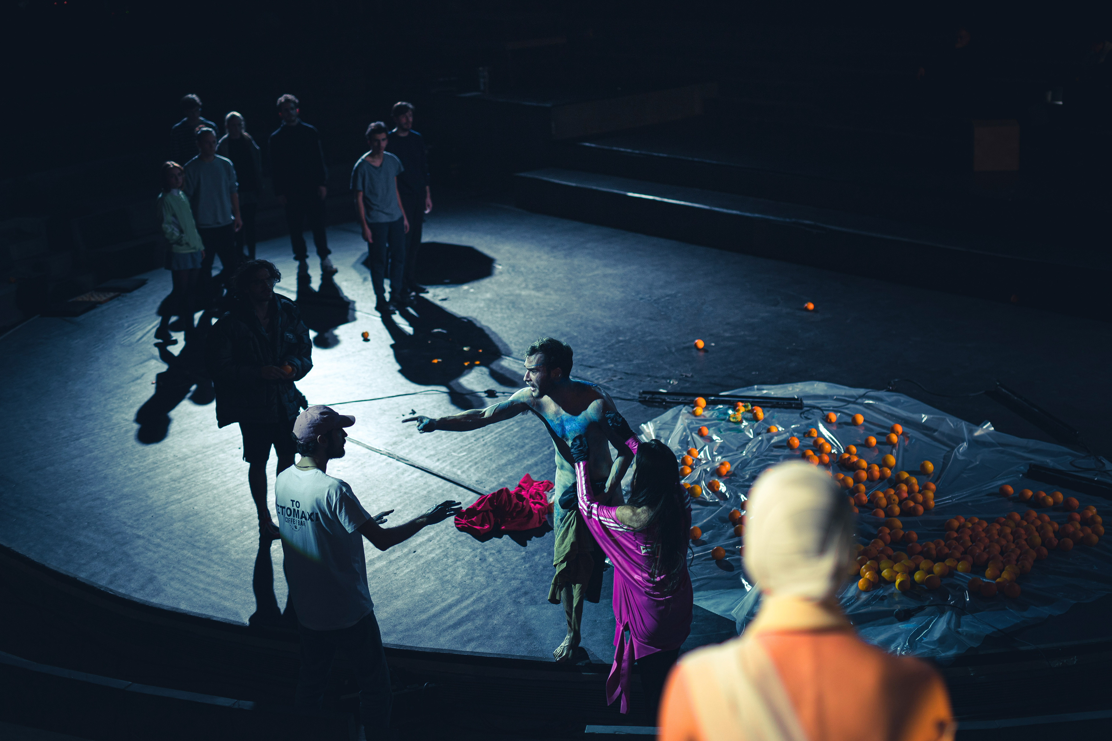 Actors performing on a theater stage