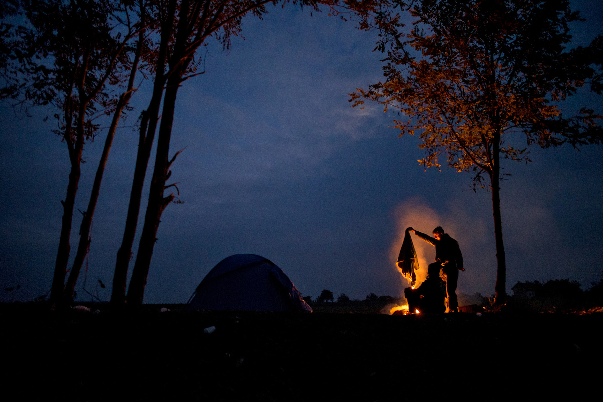 Refugee camp on the border between Serbia and Croatia. Refugees wait for the permission to enter Croatia hoping to be transferred in one of EU countries. Serbia, Berkasovo, 24.10.2015.