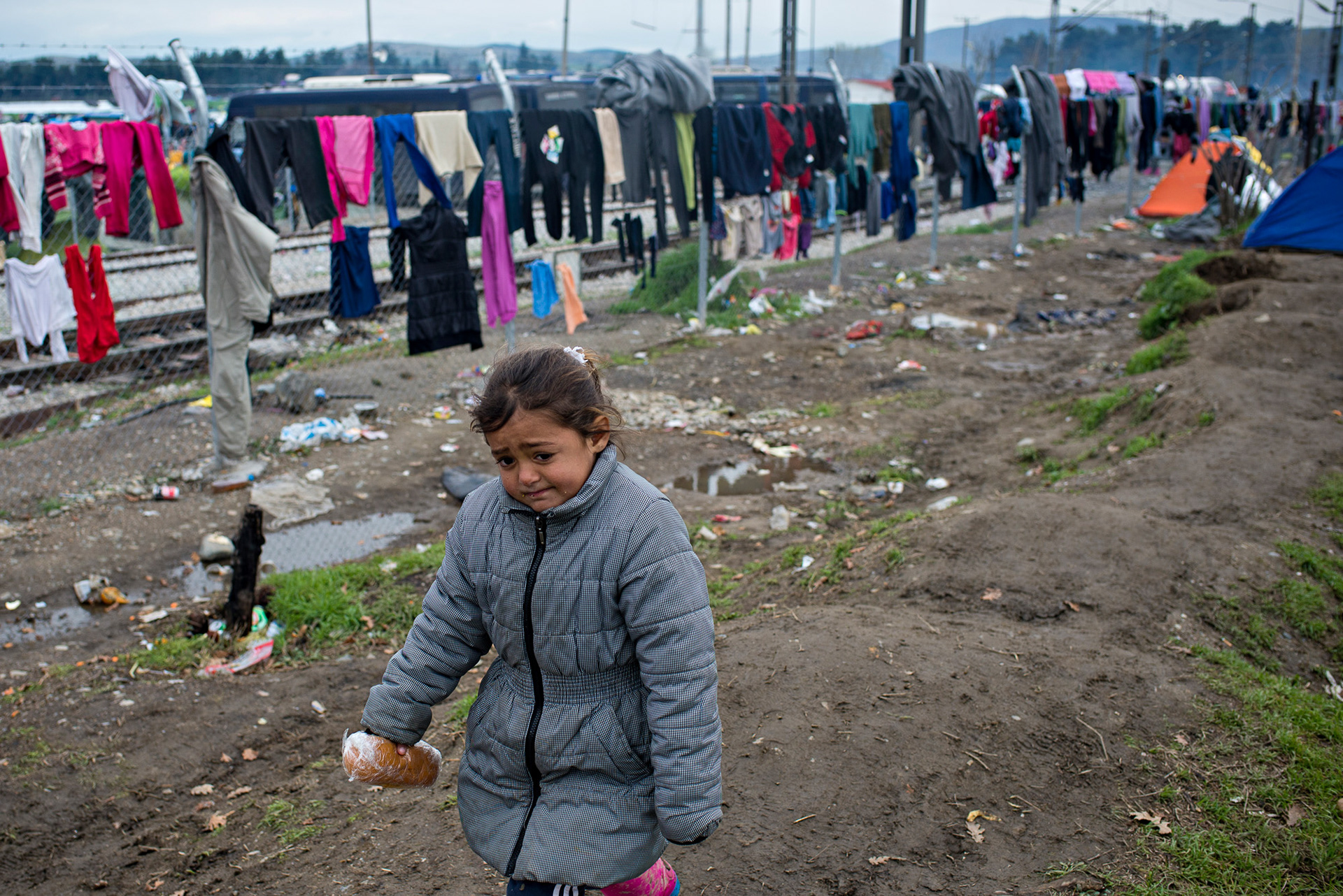 As Macedonian border is closed, refugees wait in the camp beside Idomeni train station. Greece, Idomeni, 14.03.2016.