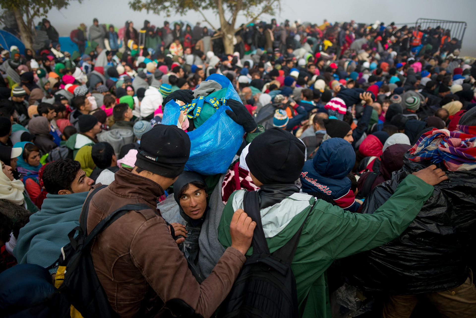Refugee camp on the border between Serbia and Croatia. Refugees wait for the permission to enter Croatia hoping to be transferred in one of EU countries. Serbia, Berkasovo, 23.10.2015.