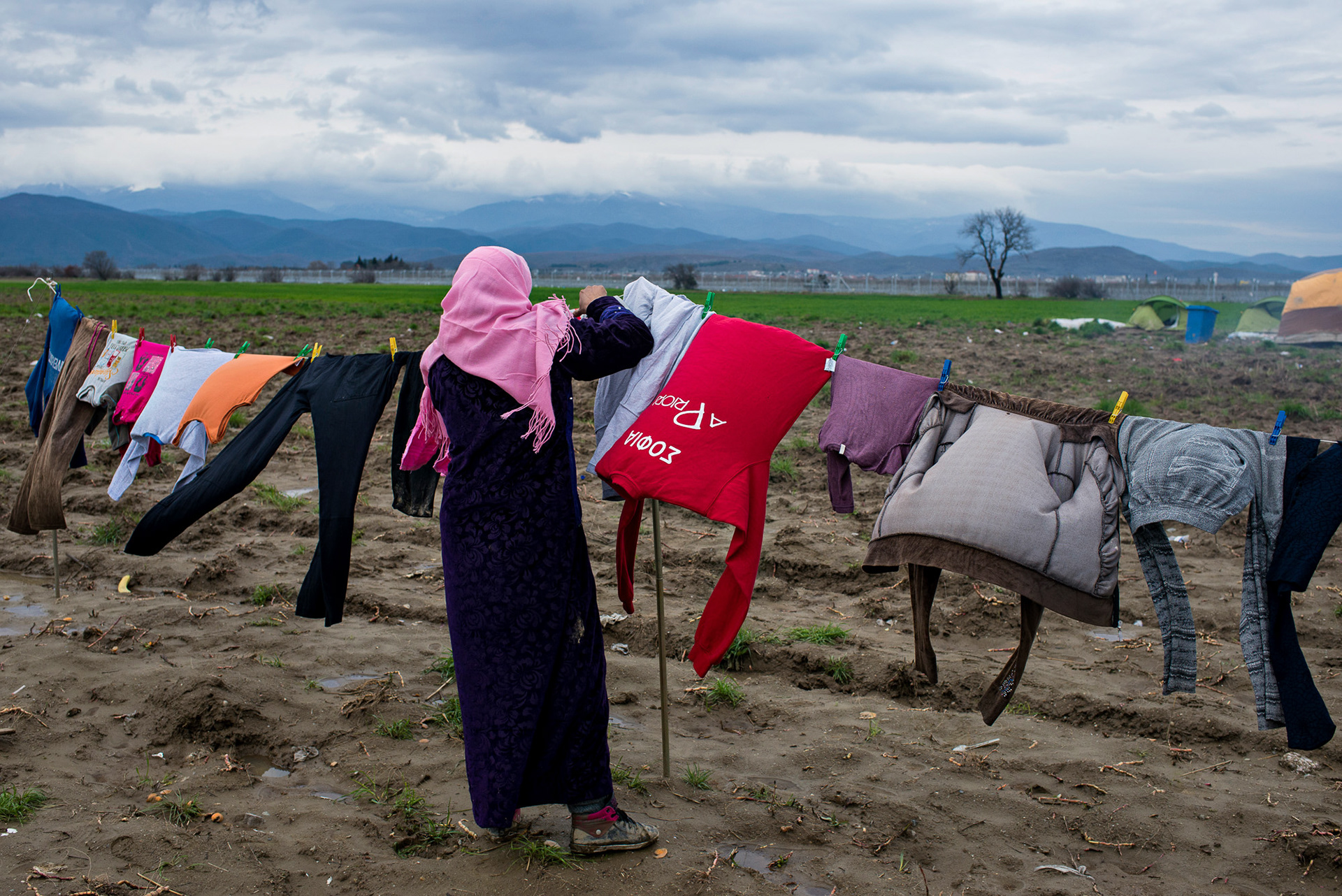 As Macedonian border is closed, refugees wait in the camp beside Idomeni train station. Greece, Idomeni, 14.03.2016.