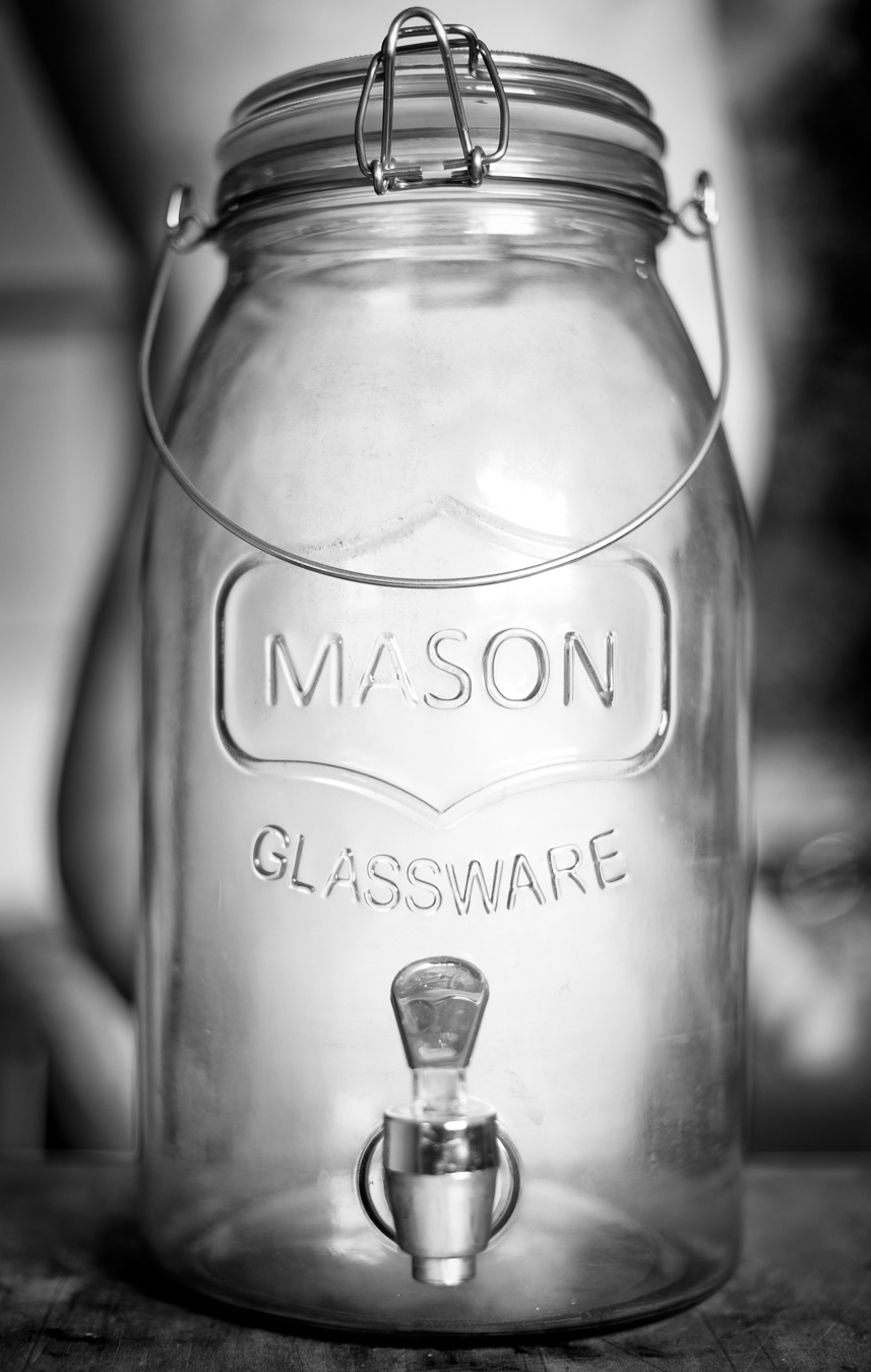 Mason Jar In Front Of Nude