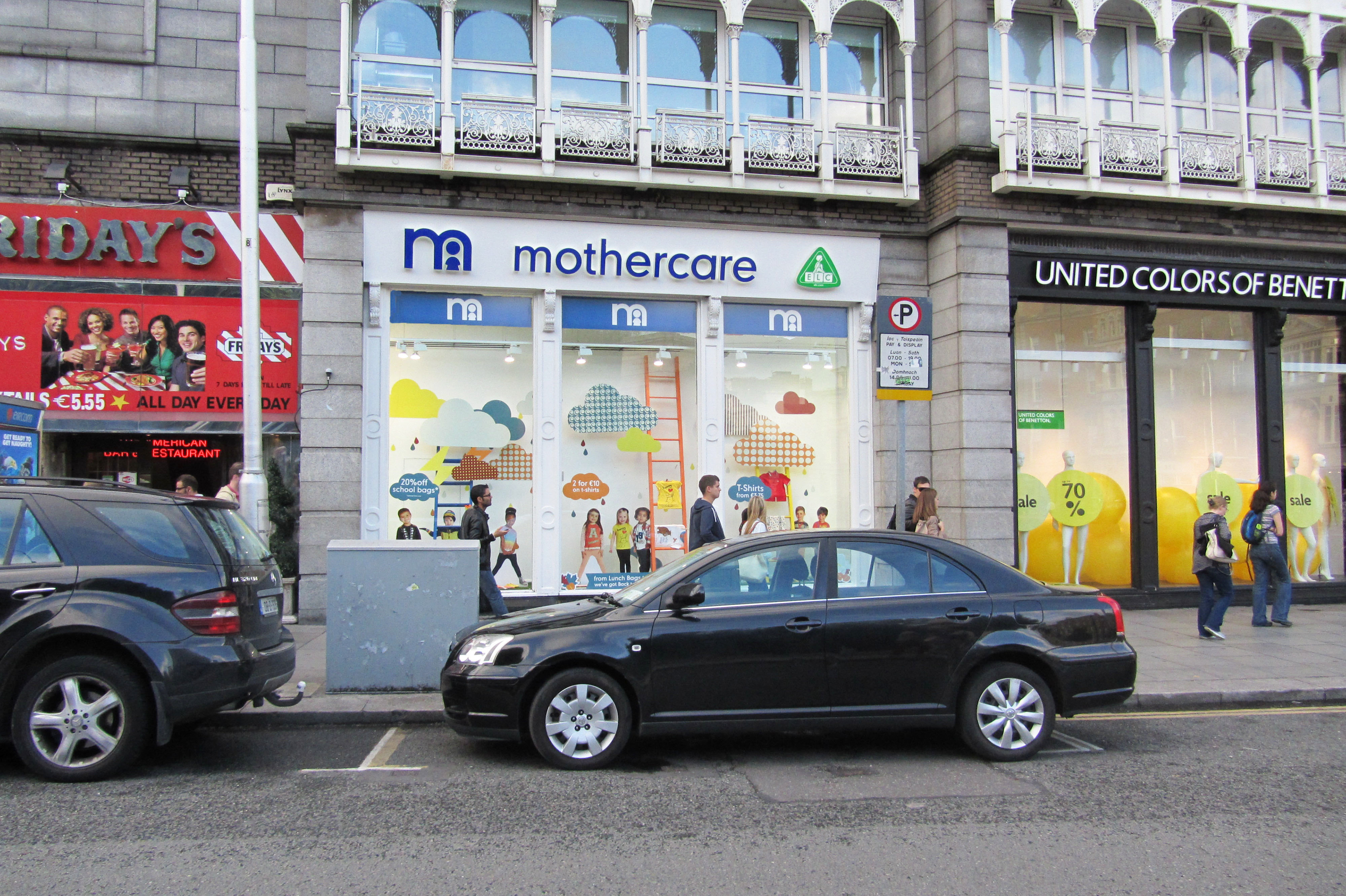 visual merchandising design retail store dublin waterford newry ireland eye catching colourful children's clothes window vinyl decals cardboard props cutout